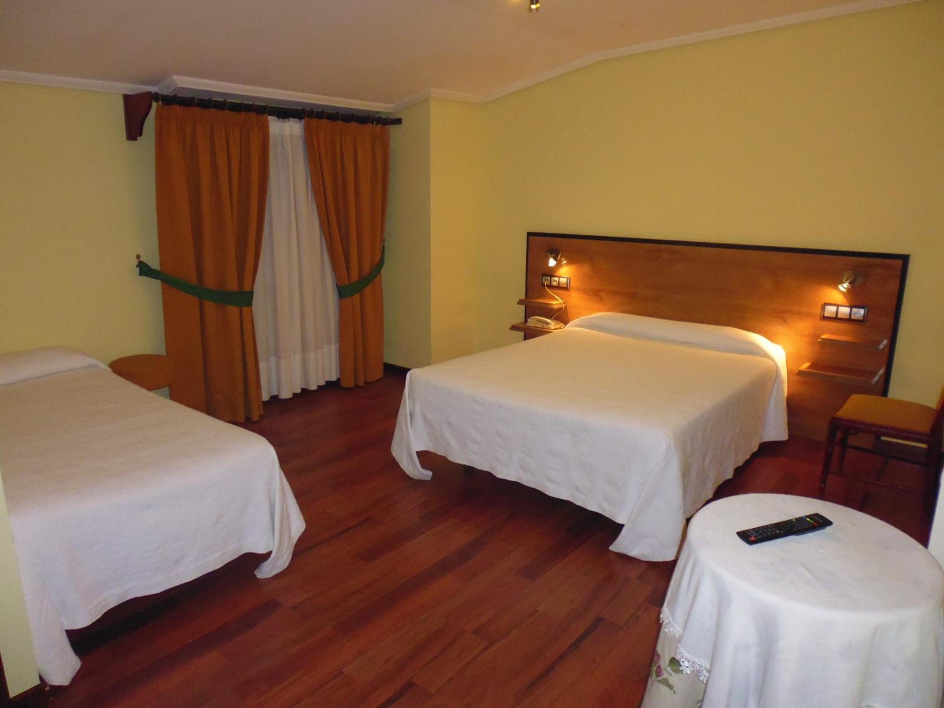 Triple Room - Photo 1