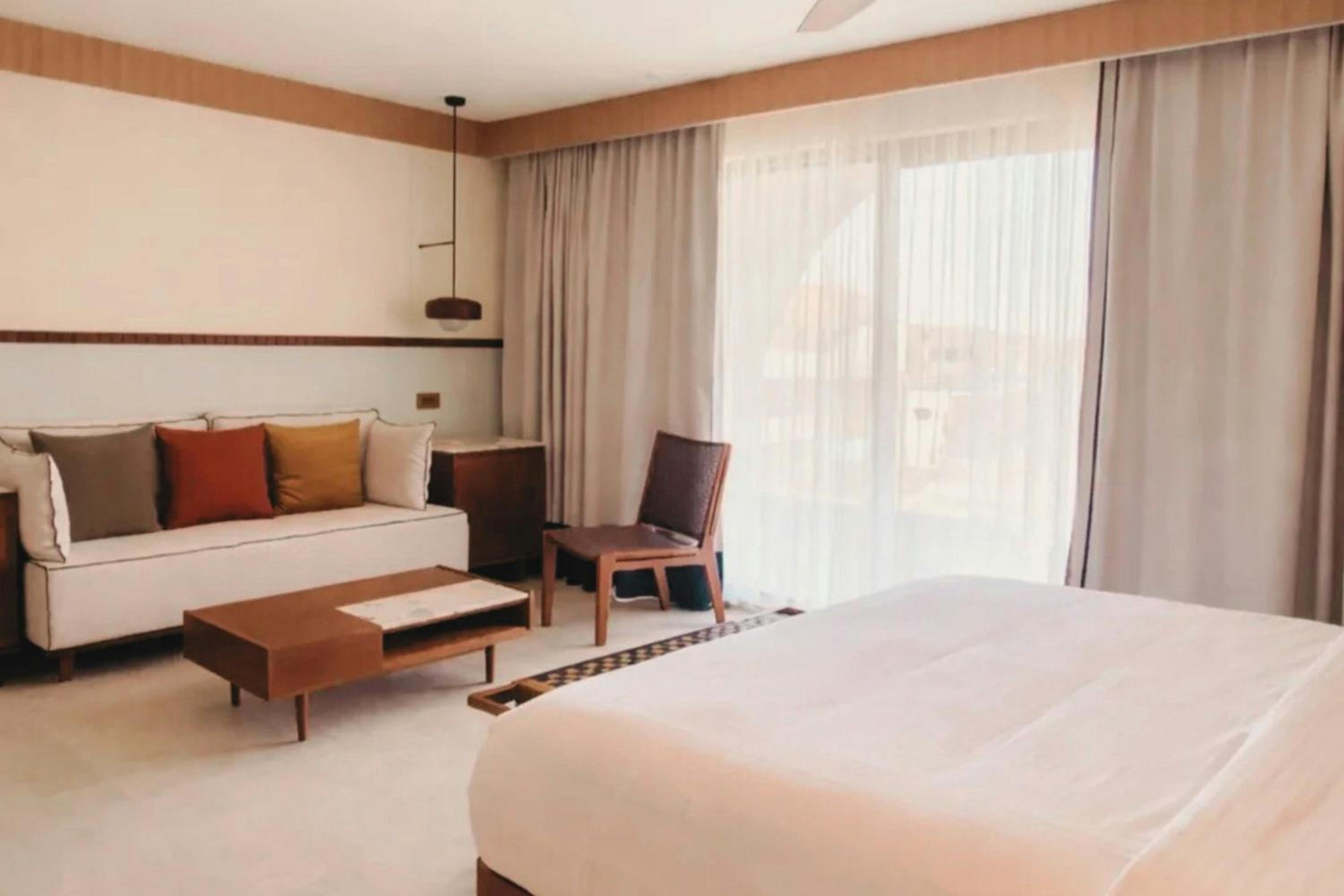 Two-Bedroom Family Suite with Balcony and Garden View