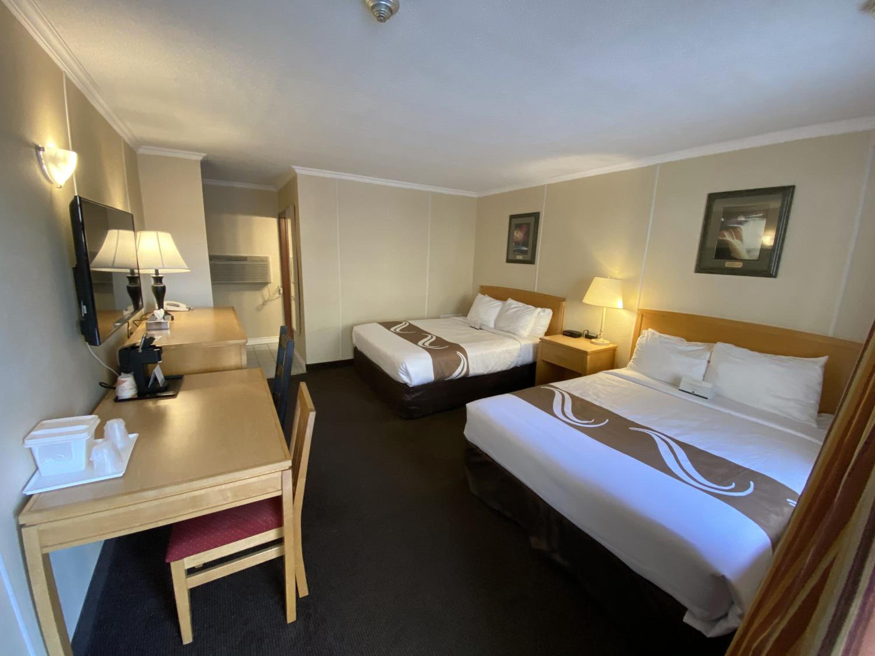 Queen Room with Two Queen Beds - Non-Smoking Exterior Building - Photo 1