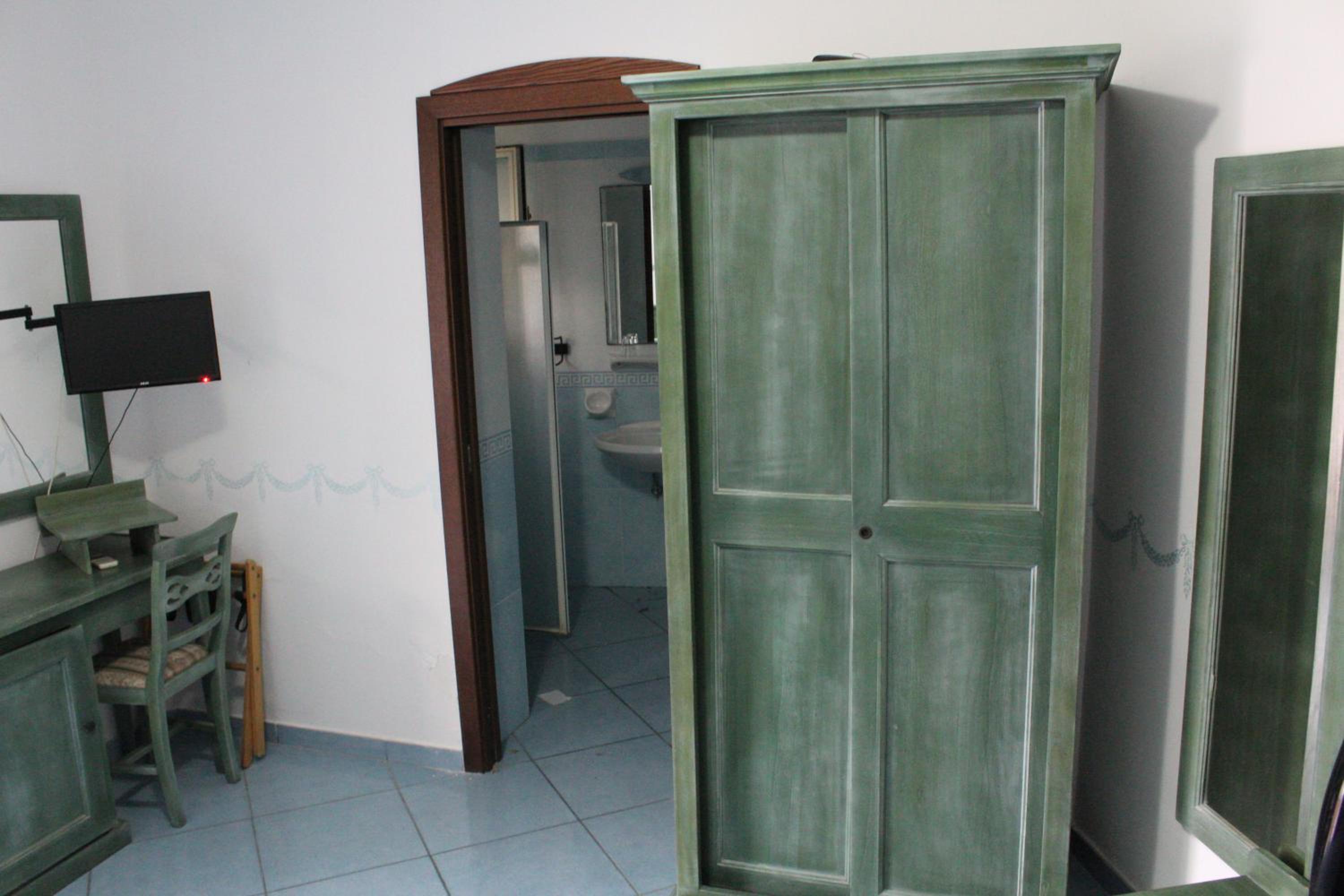 Quadruple Room - Photo 9
