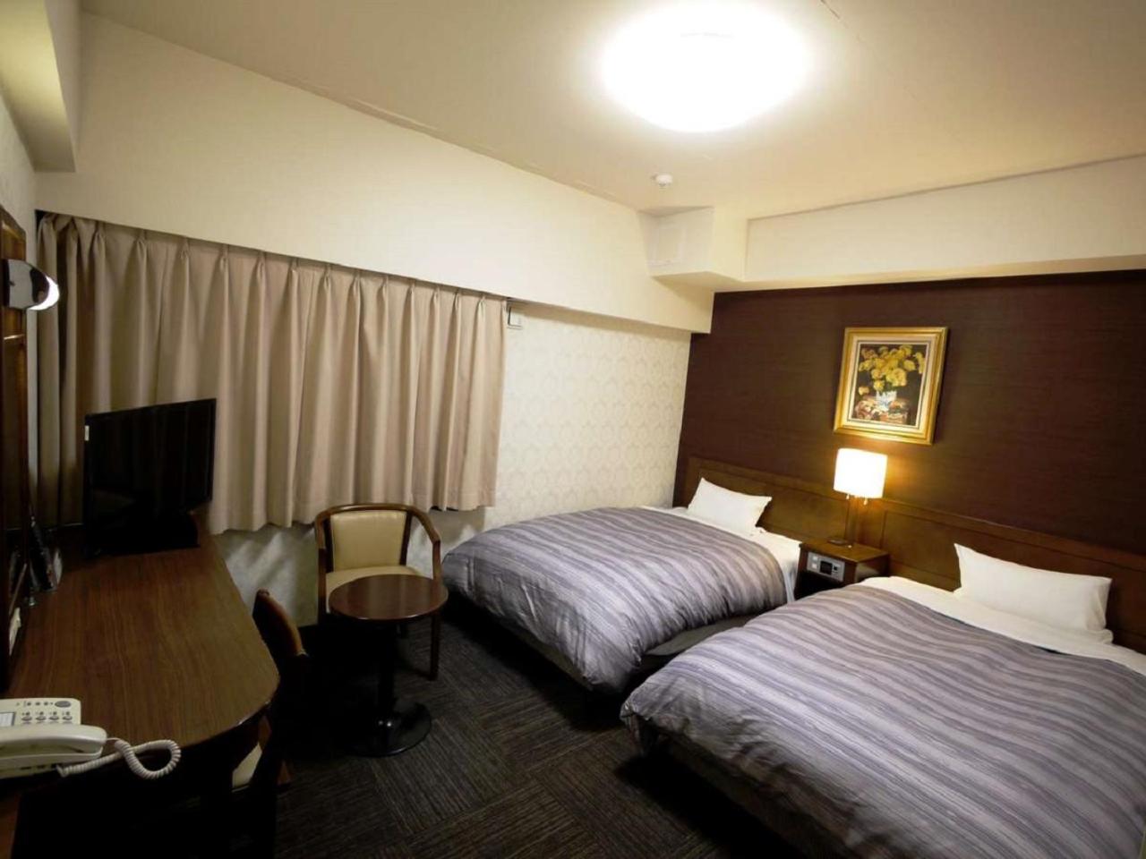Twin Room - Non-Smoking - Photo 11