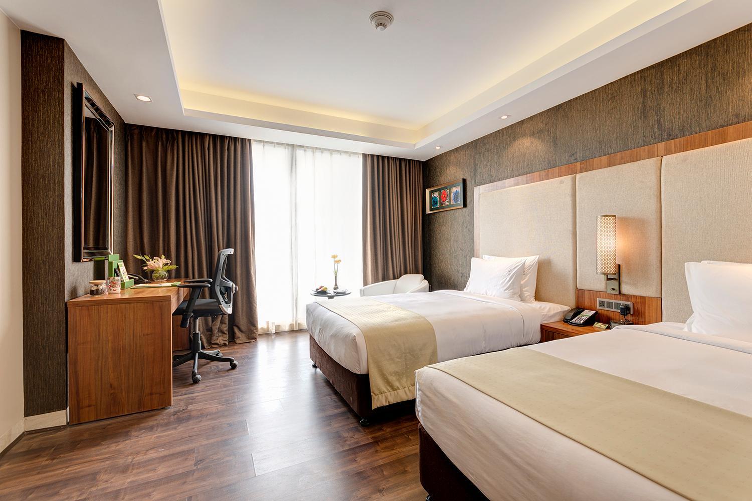 Standard Twin Room – Enjoy 20% savings on Food & Beverages (soft), Happy Hours: Buy 1 Get 1 on IMFL (4:00 PM – 8:00 PM), Complimentary snacks with select liquor packages, Beer buckets starting from just ₹599, Special pricing on liquor bottles