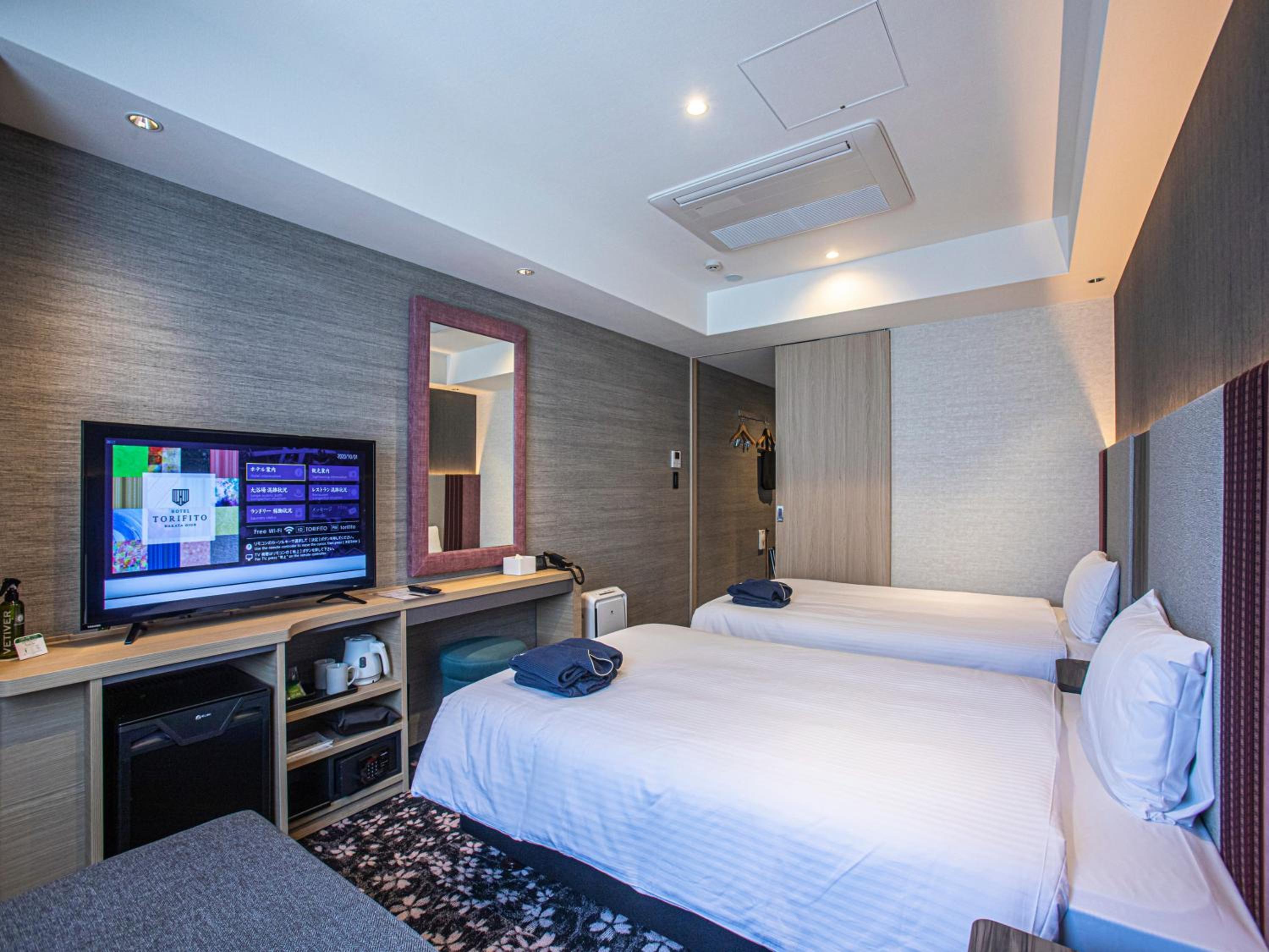 Twin Room - Photo 9