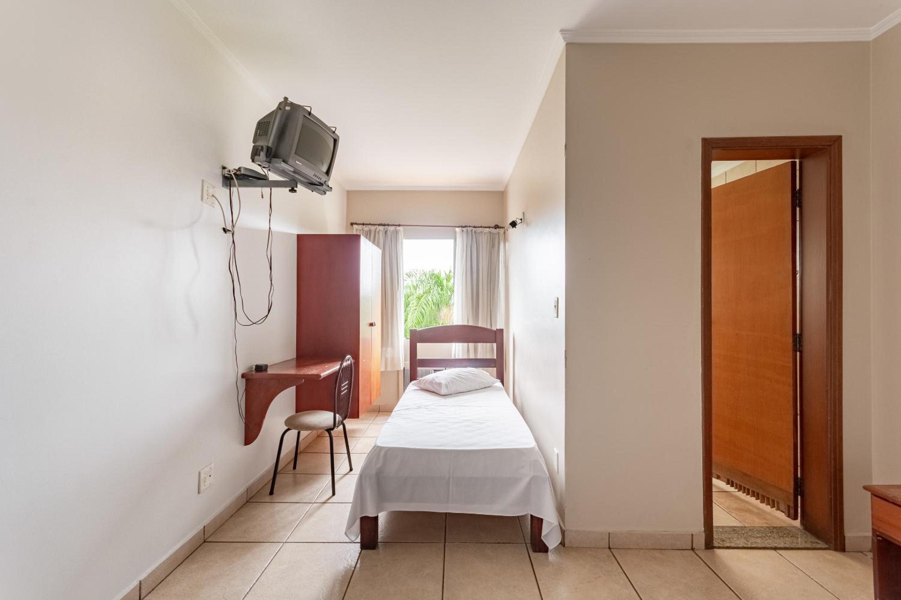 Quadruple Room (1 Double bed + 2 Single beds) photo 2