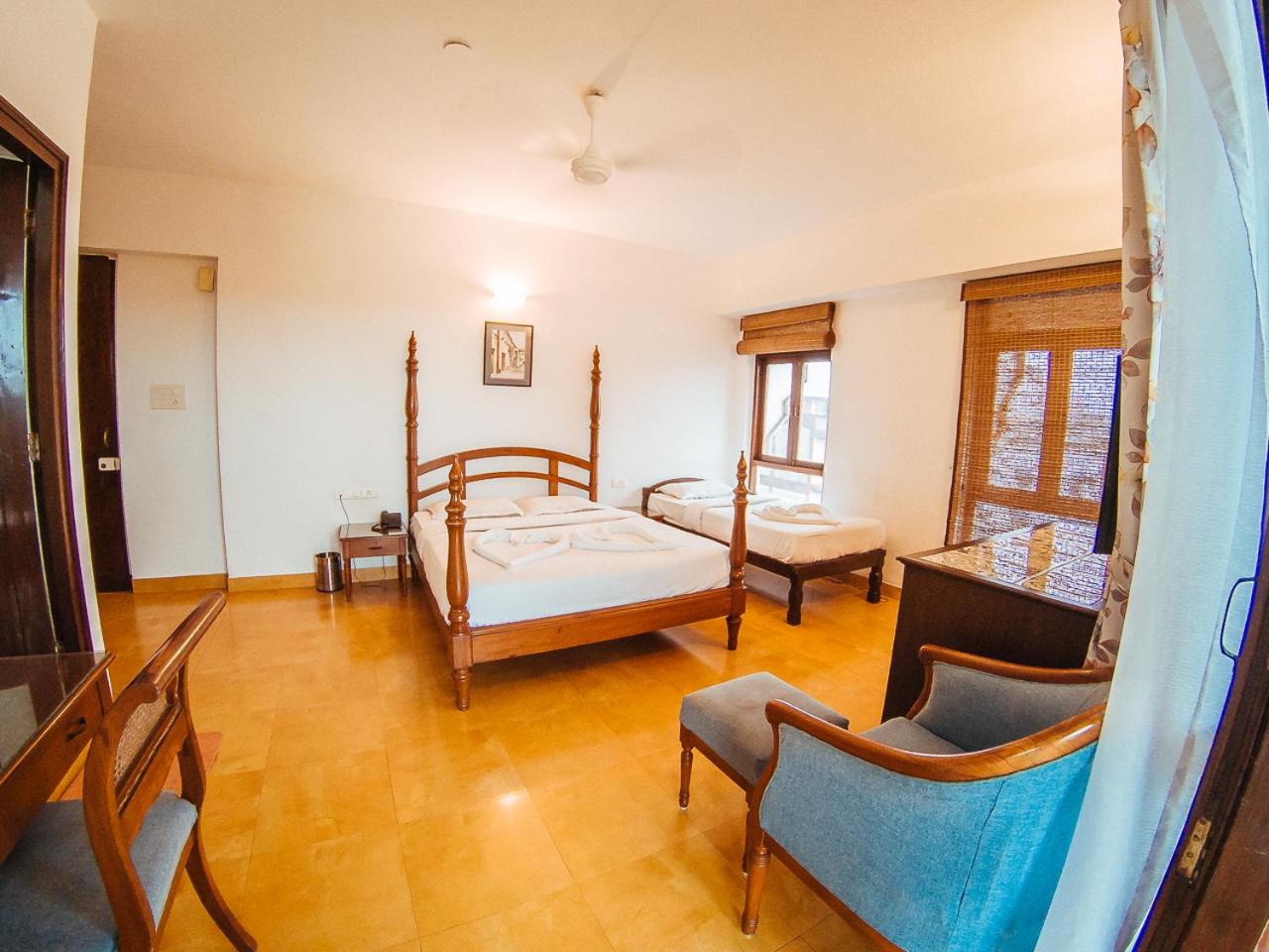 Super Deluxe Triple Room - Photo 19
