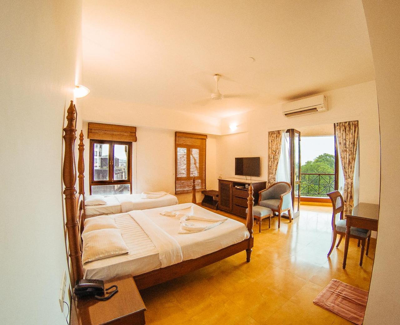 Super Deluxe Triple Room - Photo 1