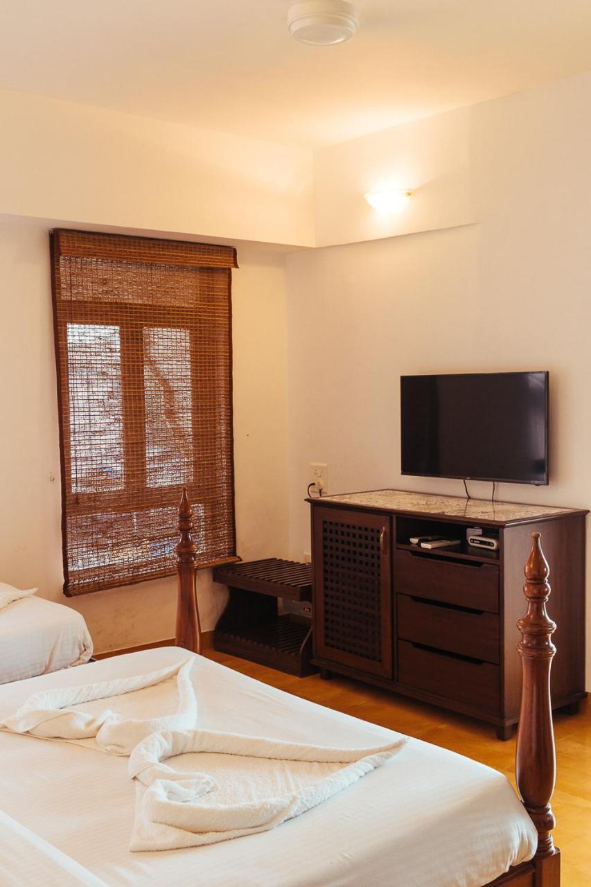 Super Deluxe Triple Room - Photo 15