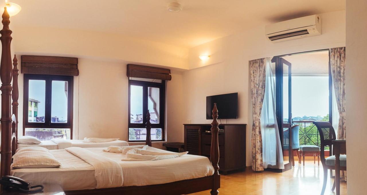 Super Deluxe Triple Room - Photo 12