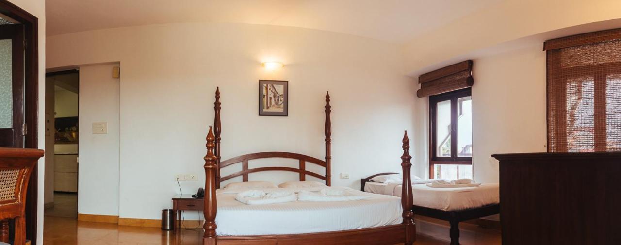 Super Deluxe Triple Room - Photo 11