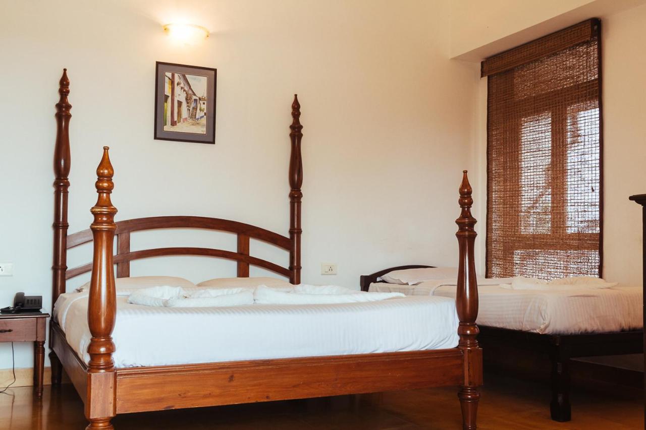 Super Deluxe Triple Room - Photo 8