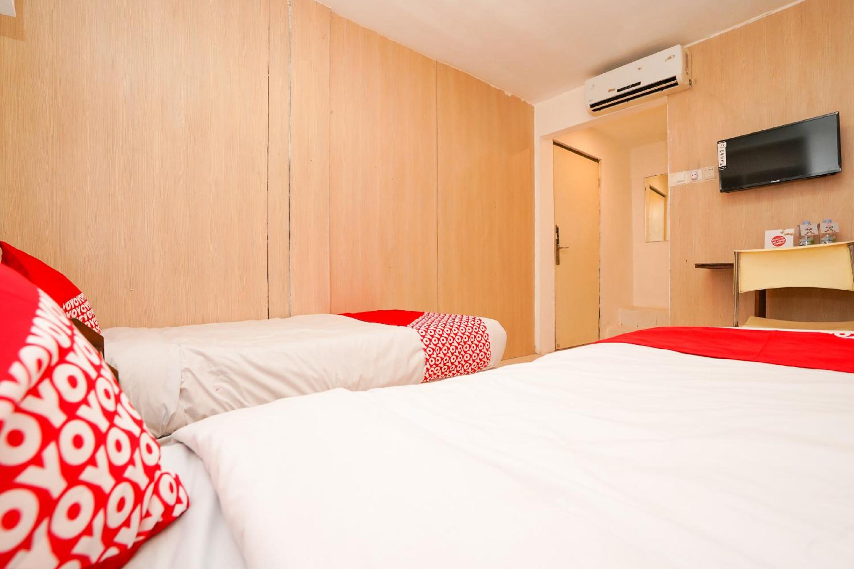 Standard Twin Room - Photo 7