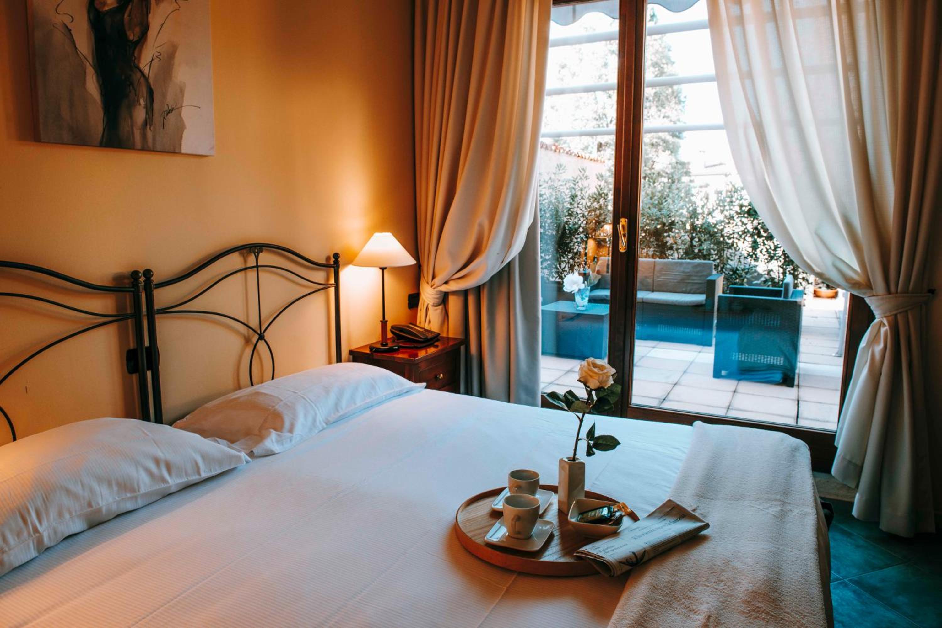 Quadruple Room with Balcony - Photo 1