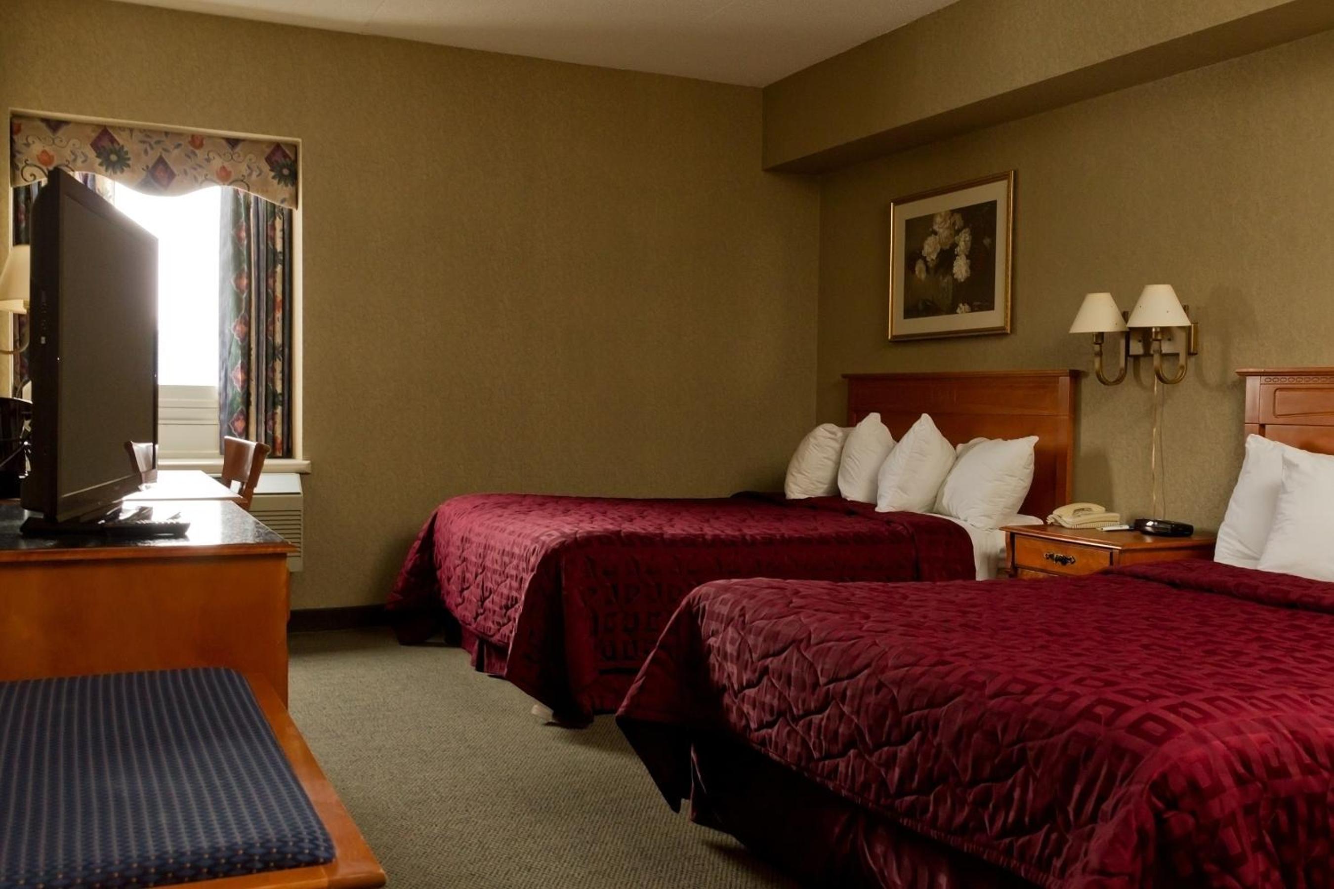 Deluxe Queen Room with Two Queen Beds - Non-Smoking photo 1