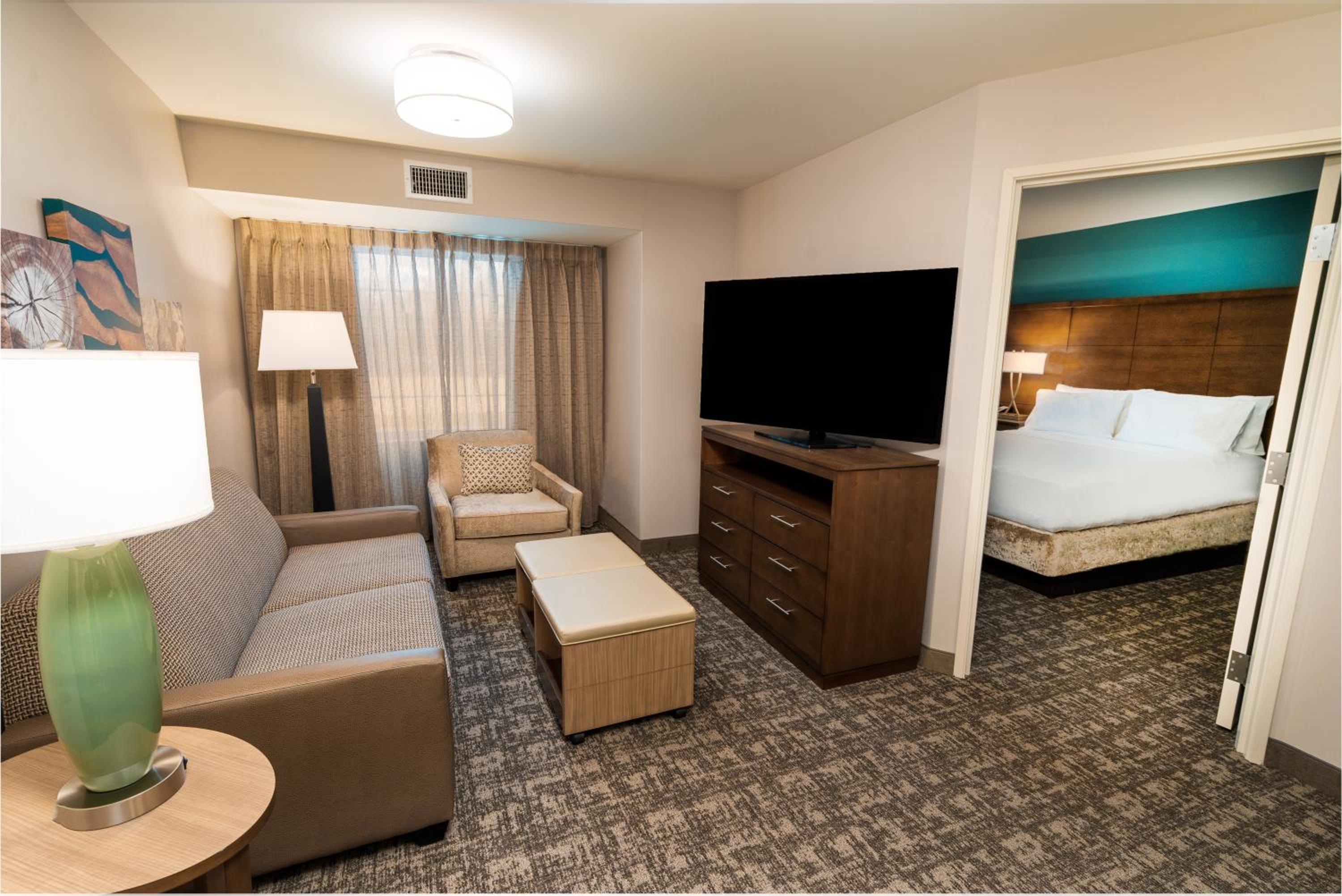 One-Bedroom Queen Suite with Two Queen Beds, Full Kitchen, Sofa Bed, Living Space - Photo 1