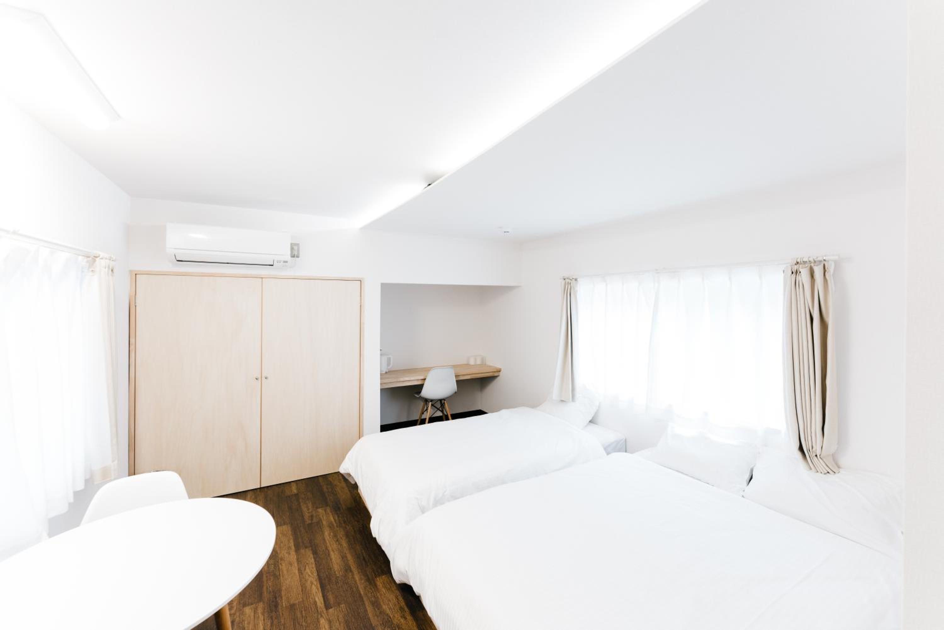 Deluxe Triple Room - Photo 8