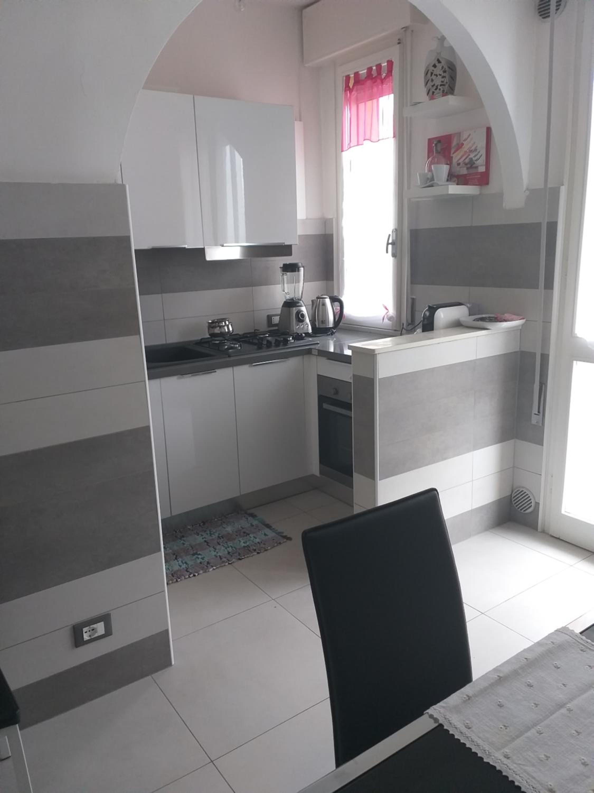Three-Bedroom Apartment - Photo 12