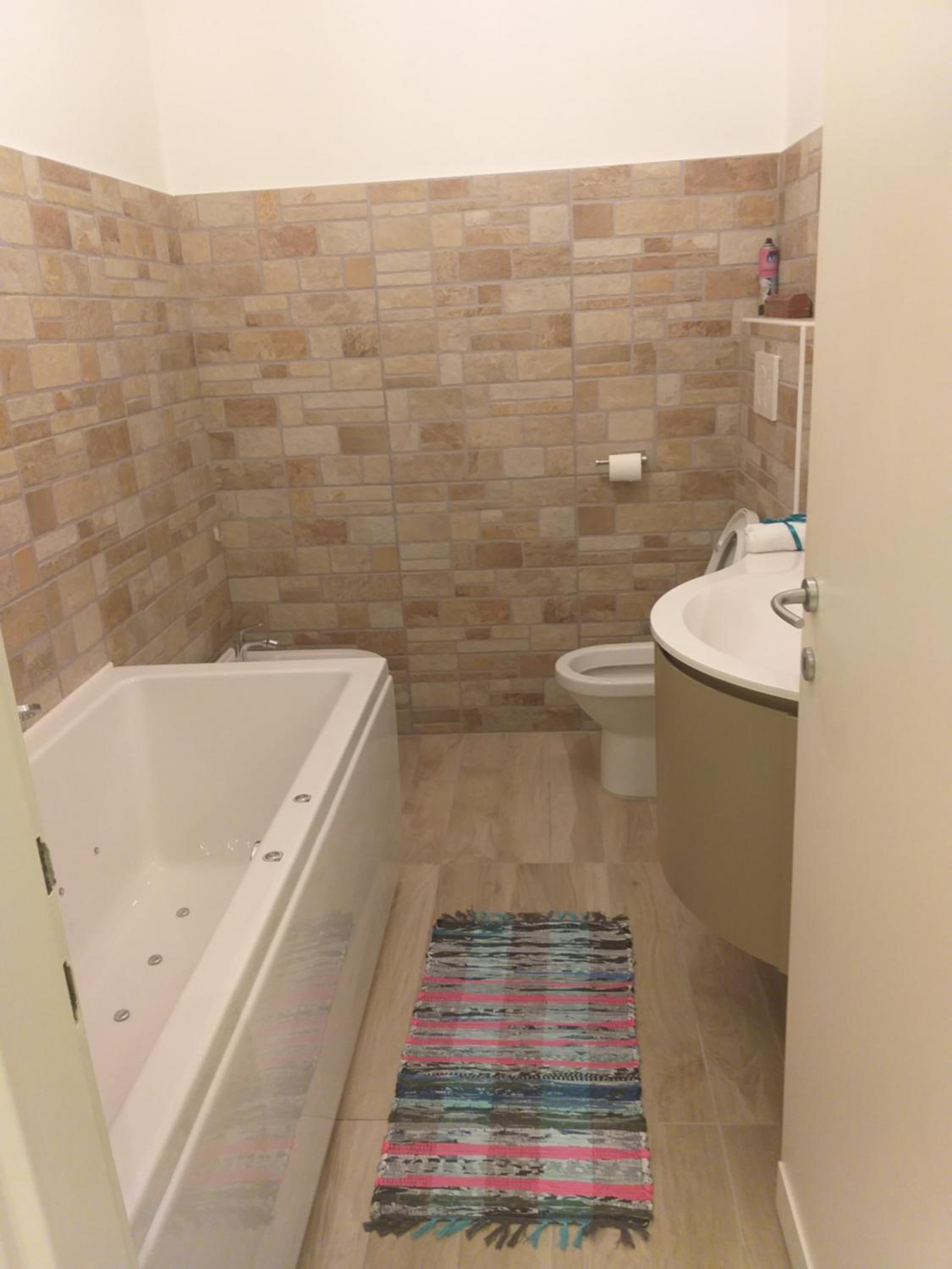 Three-Bedroom Apartment - Photo 10