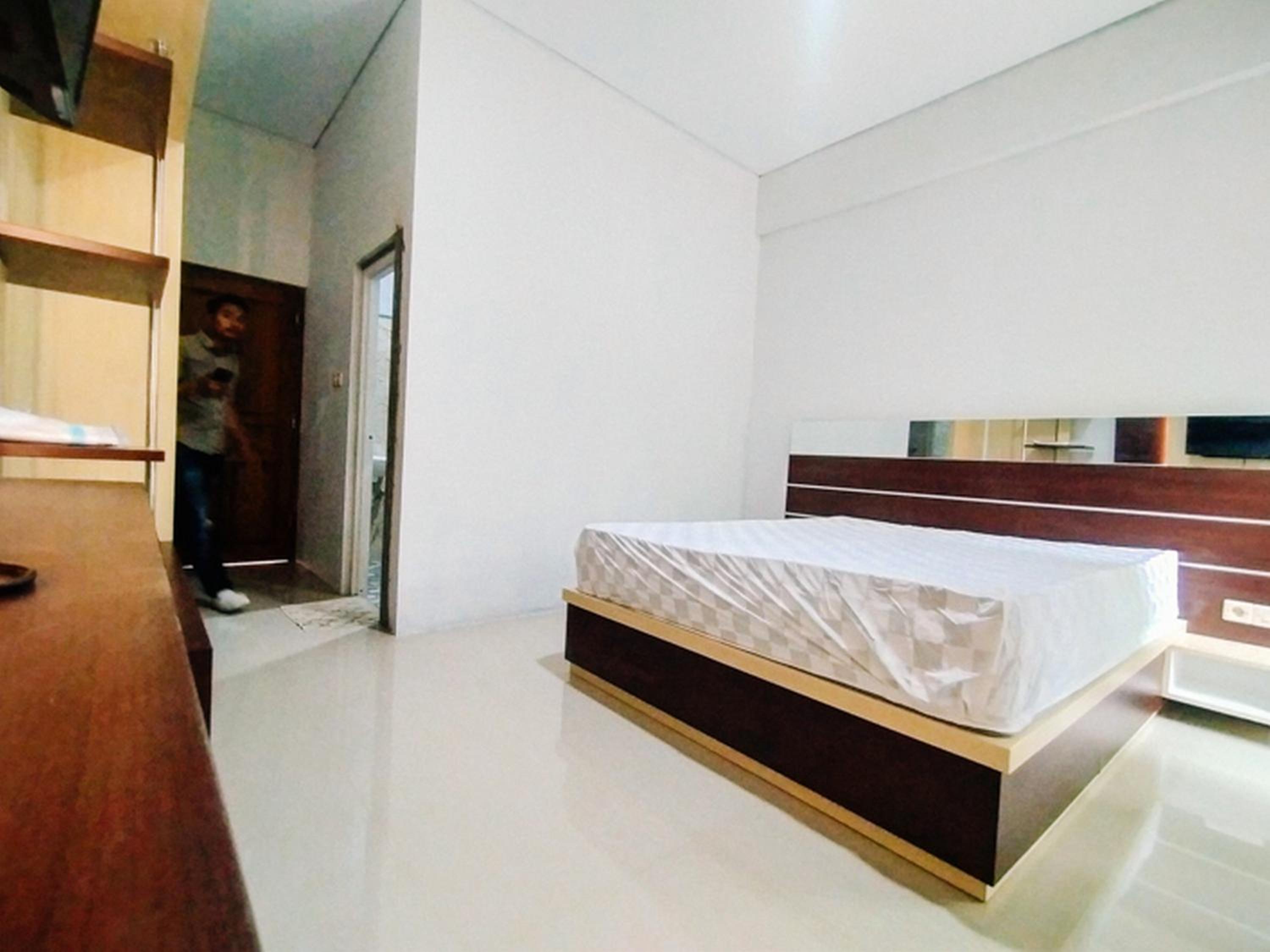 Deluxe Room - Photo 7