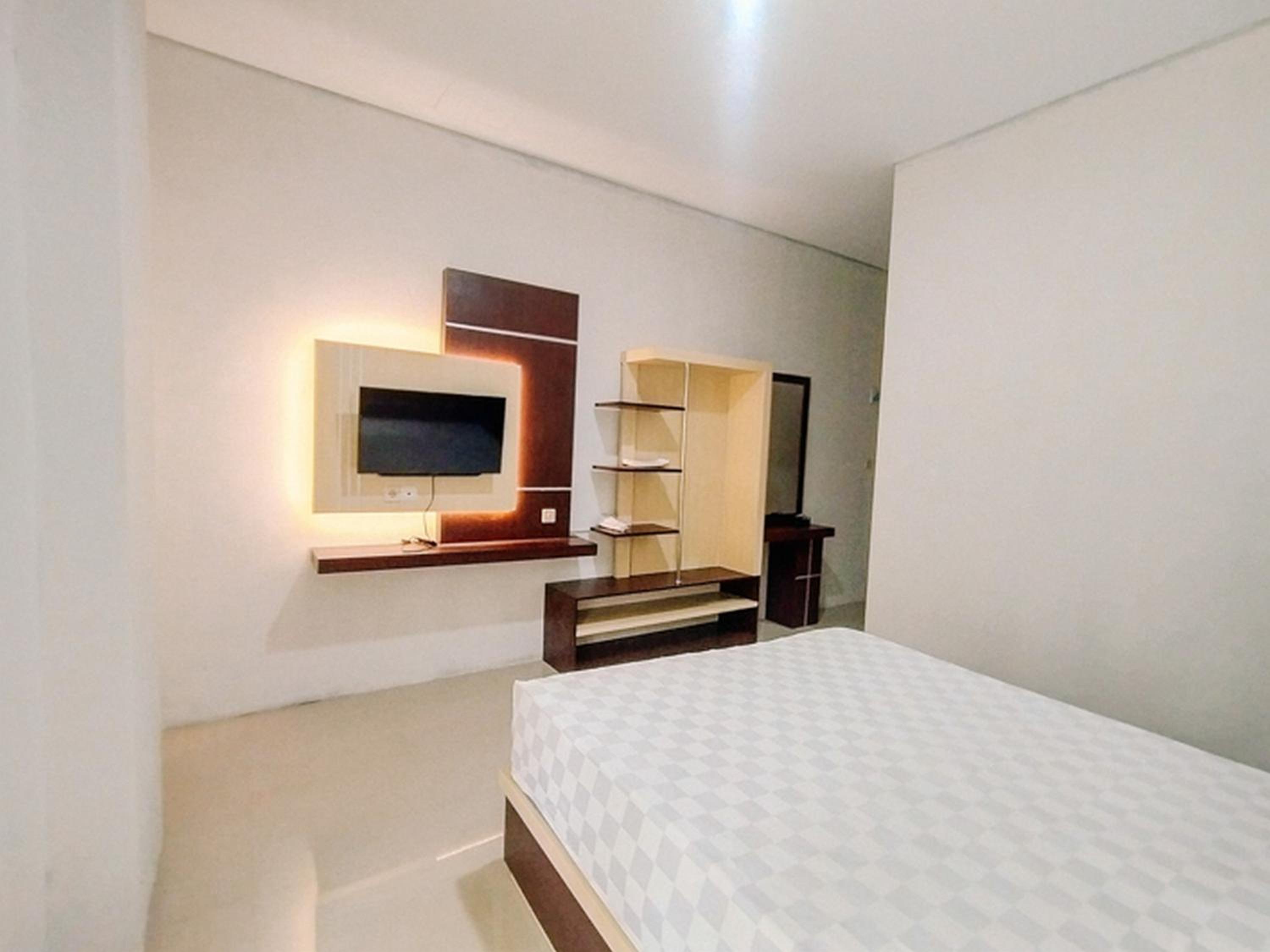 Deluxe Room - Photo 4