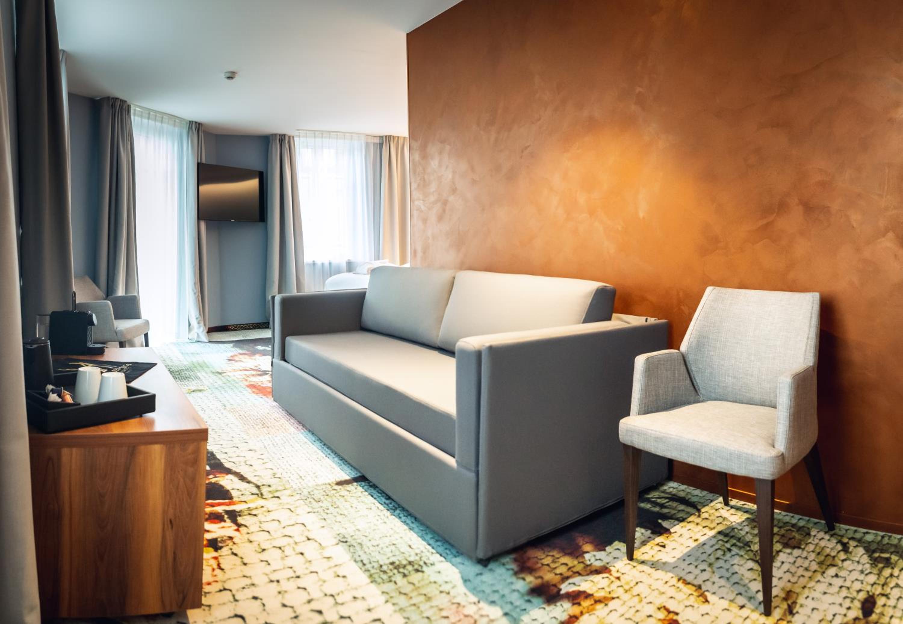 King Suite with Sofa Bed - Photo 9