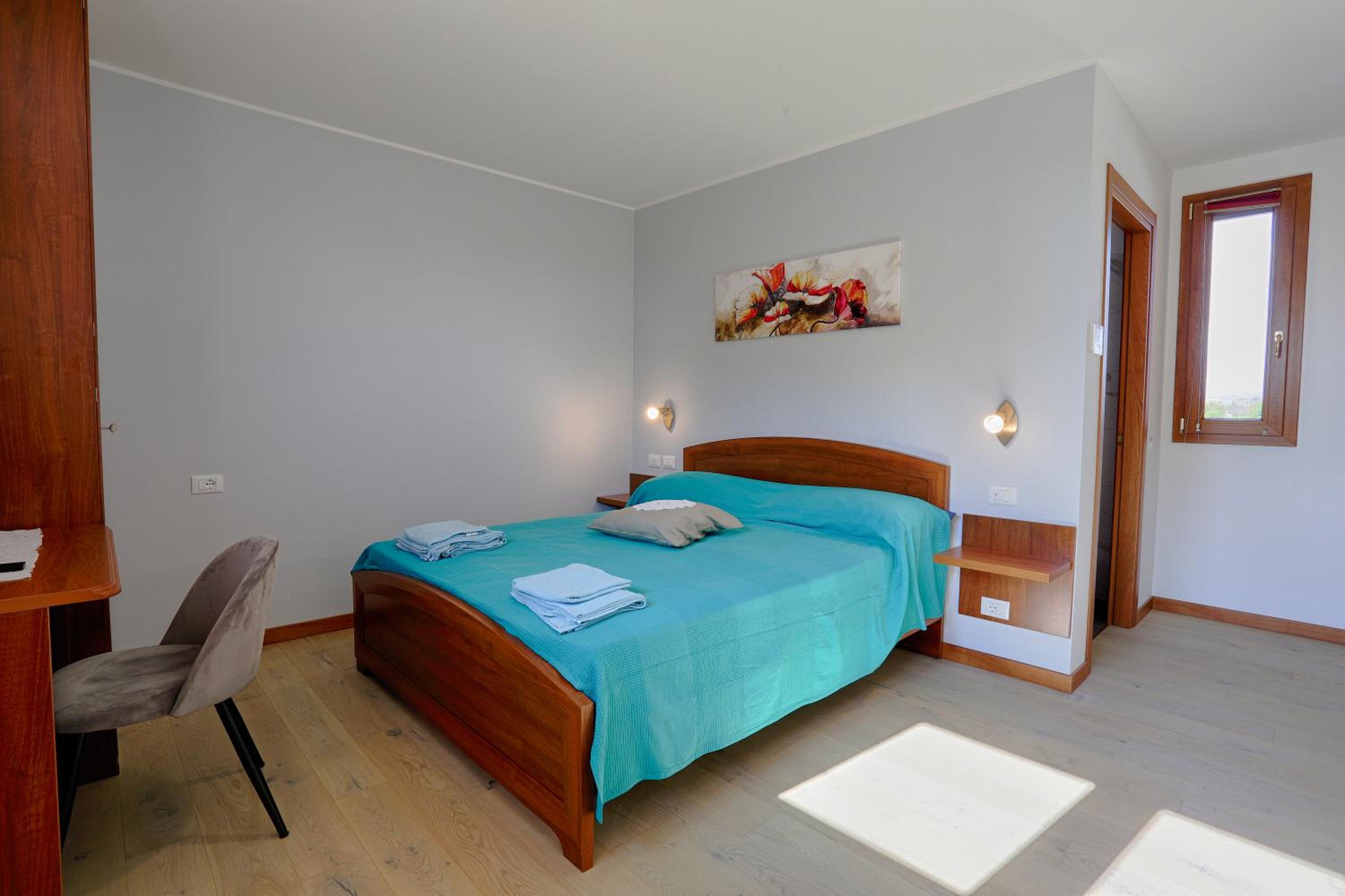 Deluxe Quadruple Room - Photo 2