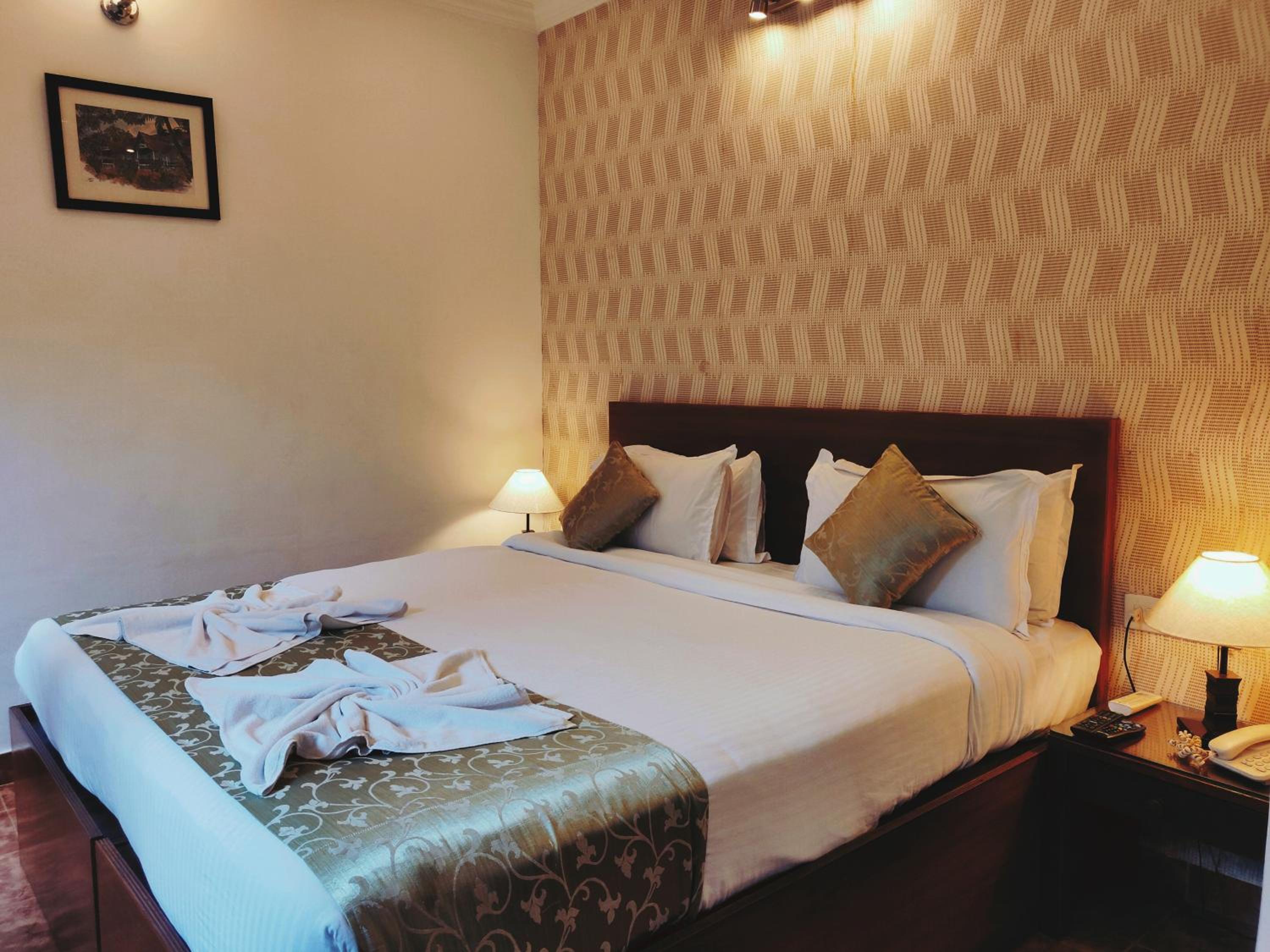 Deluxe Room - Photo 5