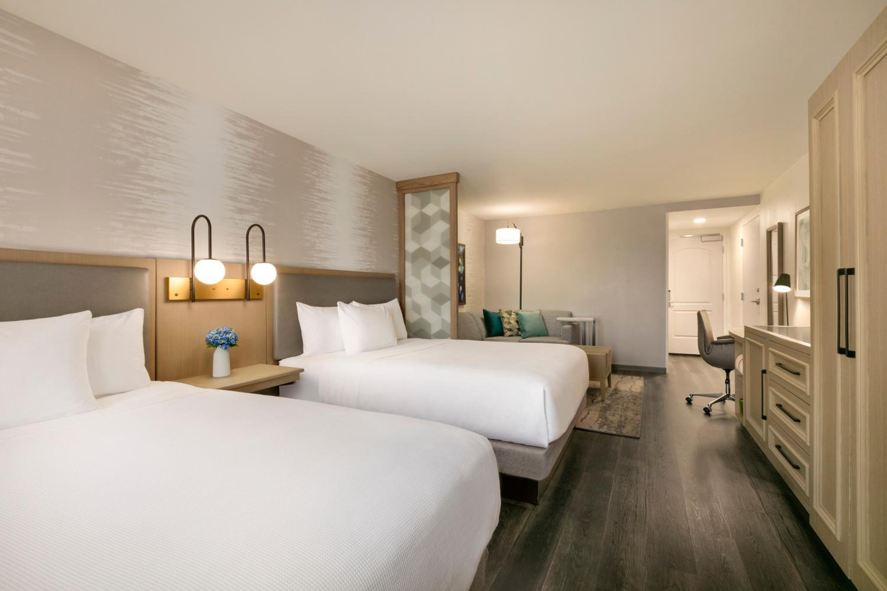 Queen Room with Two Queen Beds and Sofa Bed photo 2