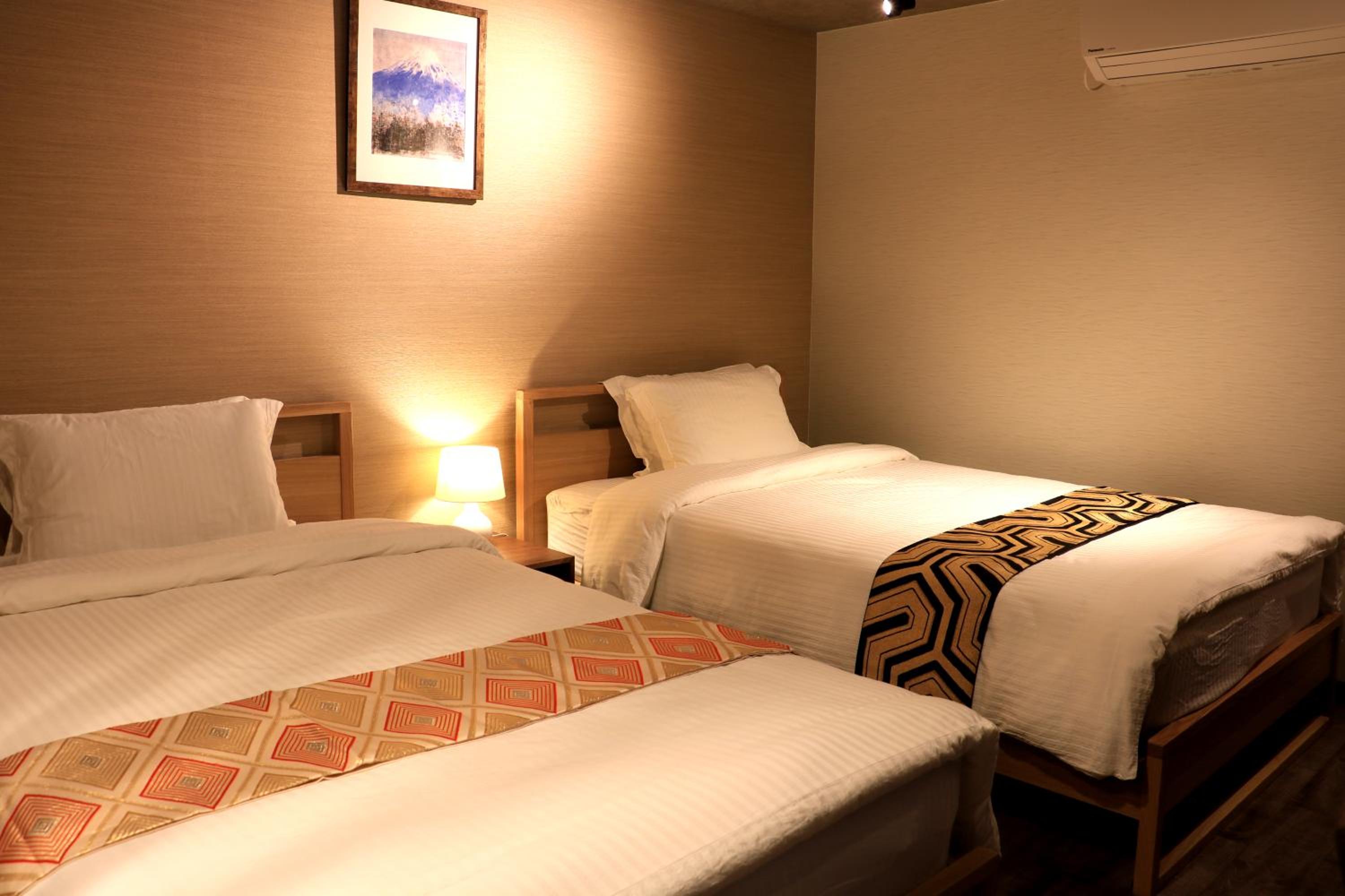 Quadruple Room with Private Bathroom