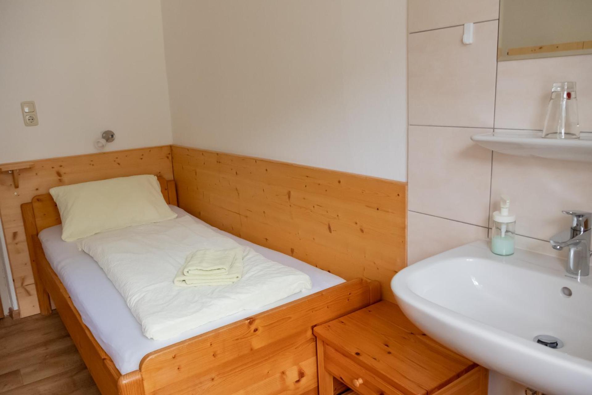 Single Room With Shared Shower And Toilet