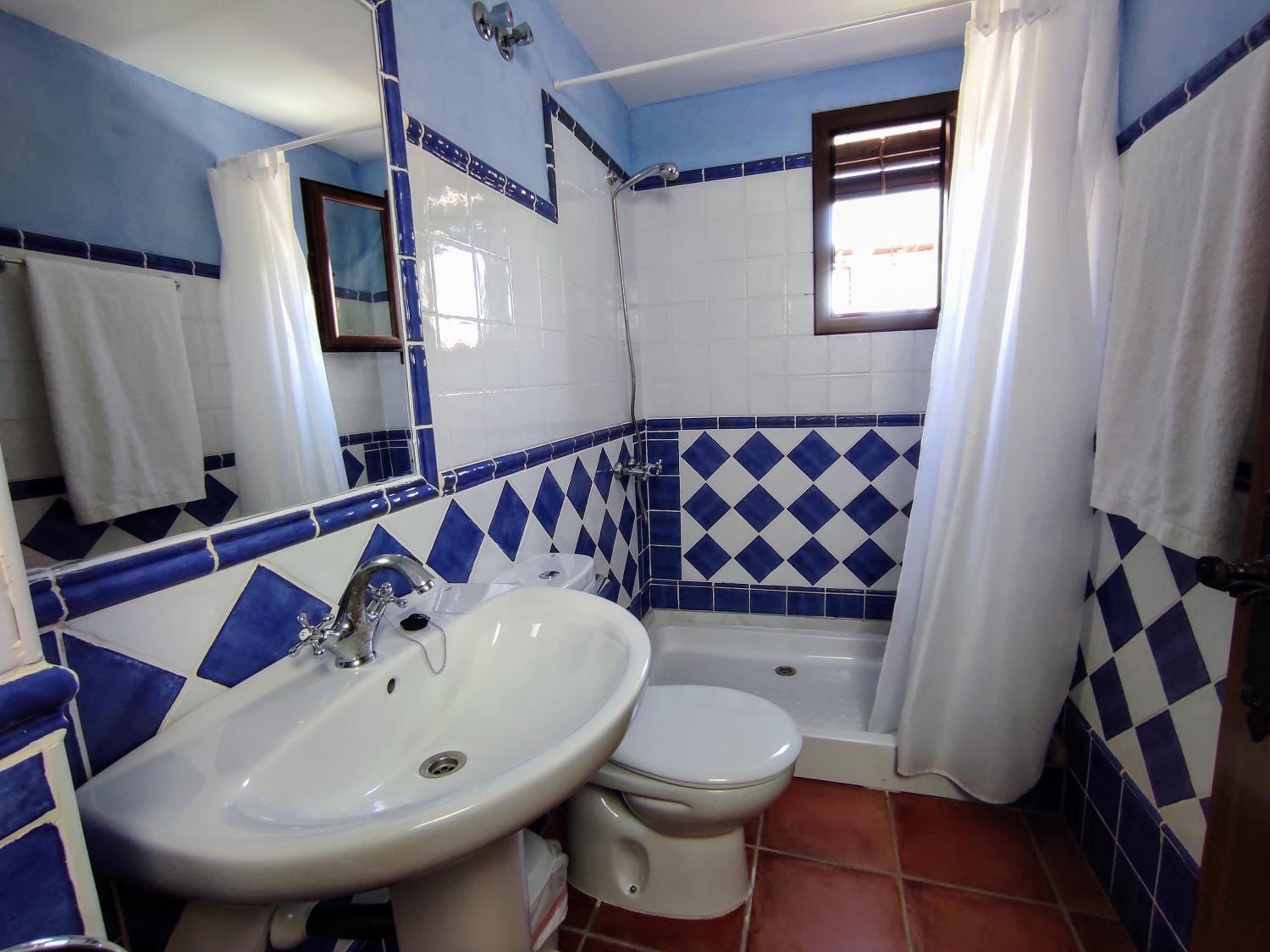 Three-Bedroom Apartment - Photo 2