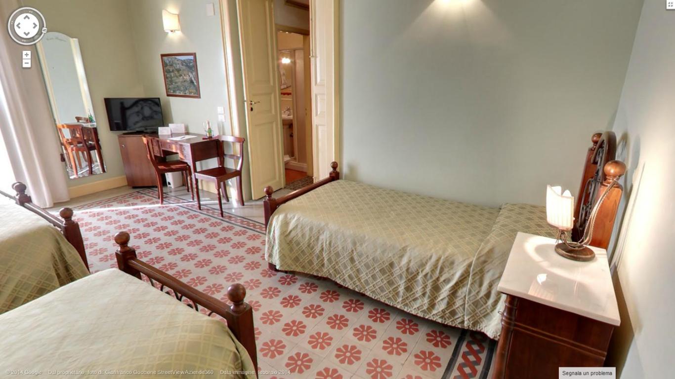 Quadruple Room with Balcony - Photo 14