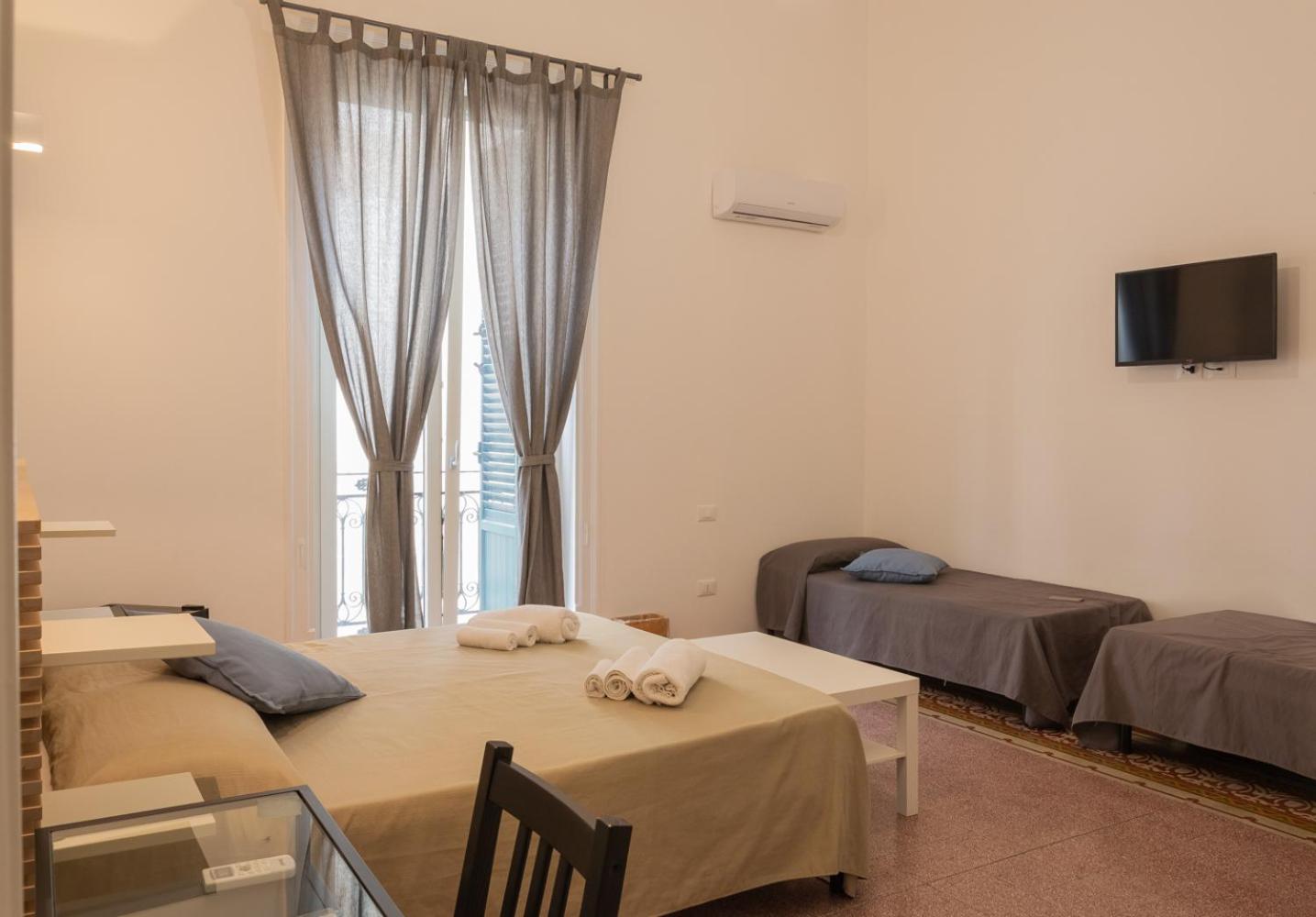 Deluxe Quadruple Room - Photo 2