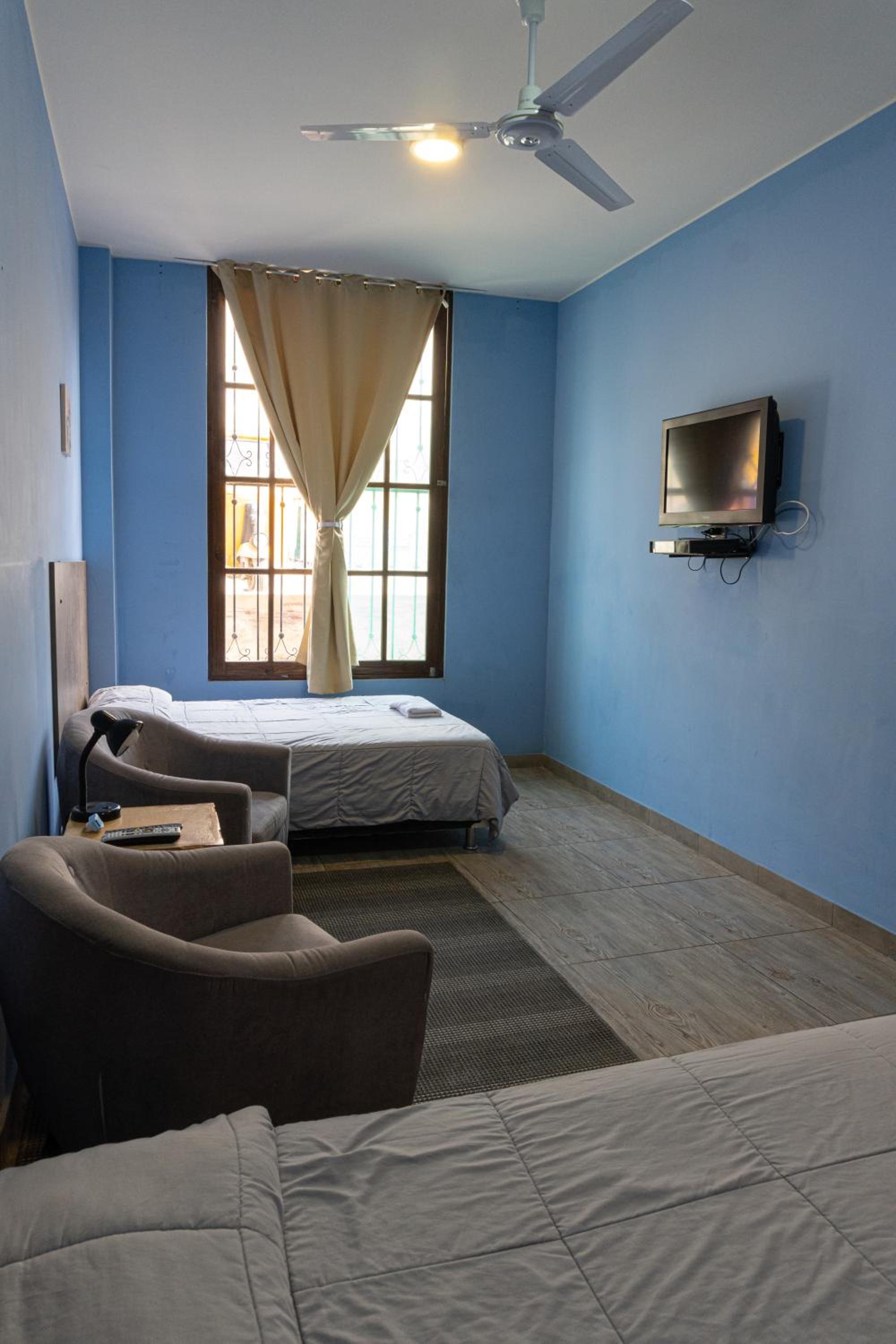 Twin Room with Two Double Beds with Private Bathroom photo 1