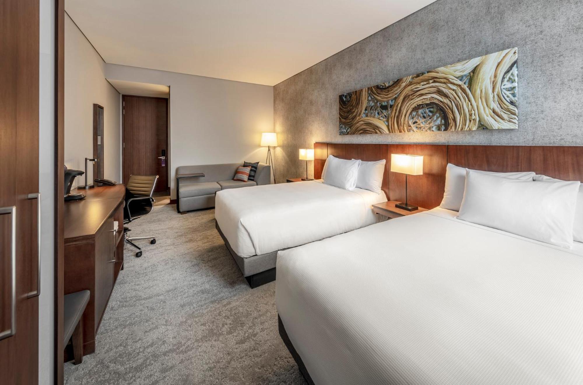 Queen Room with Two Queen Beds and Sofa Bed - Photo 3