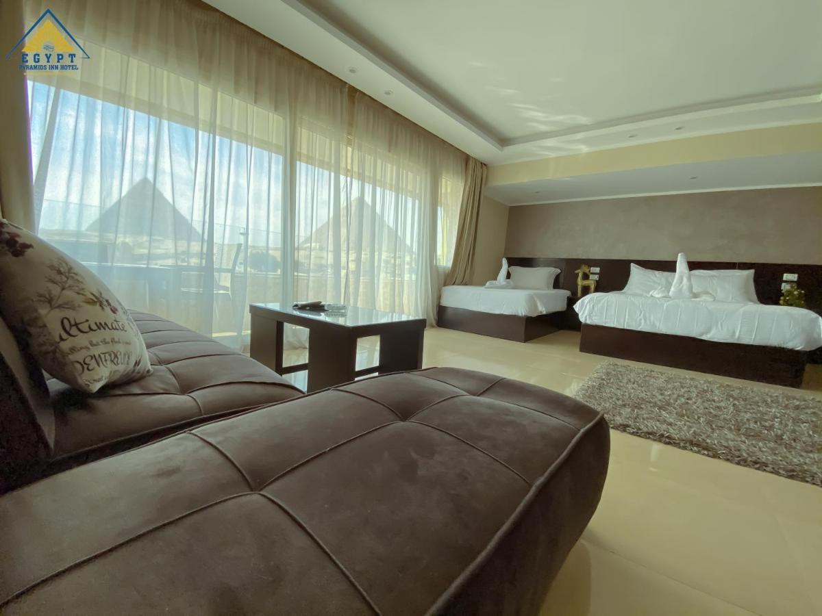 King Suite with Balcony and Pyramid View - Photo 7