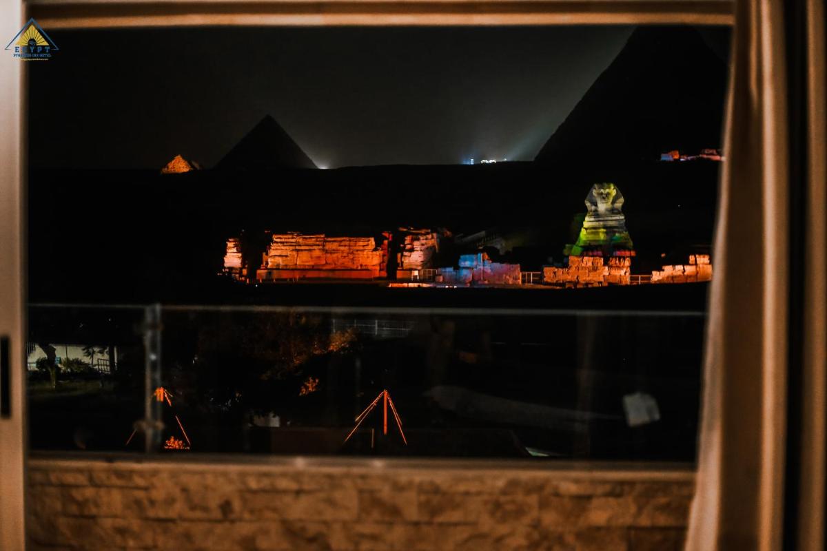Family Room with Balcony and Pyramid View - Photo 4