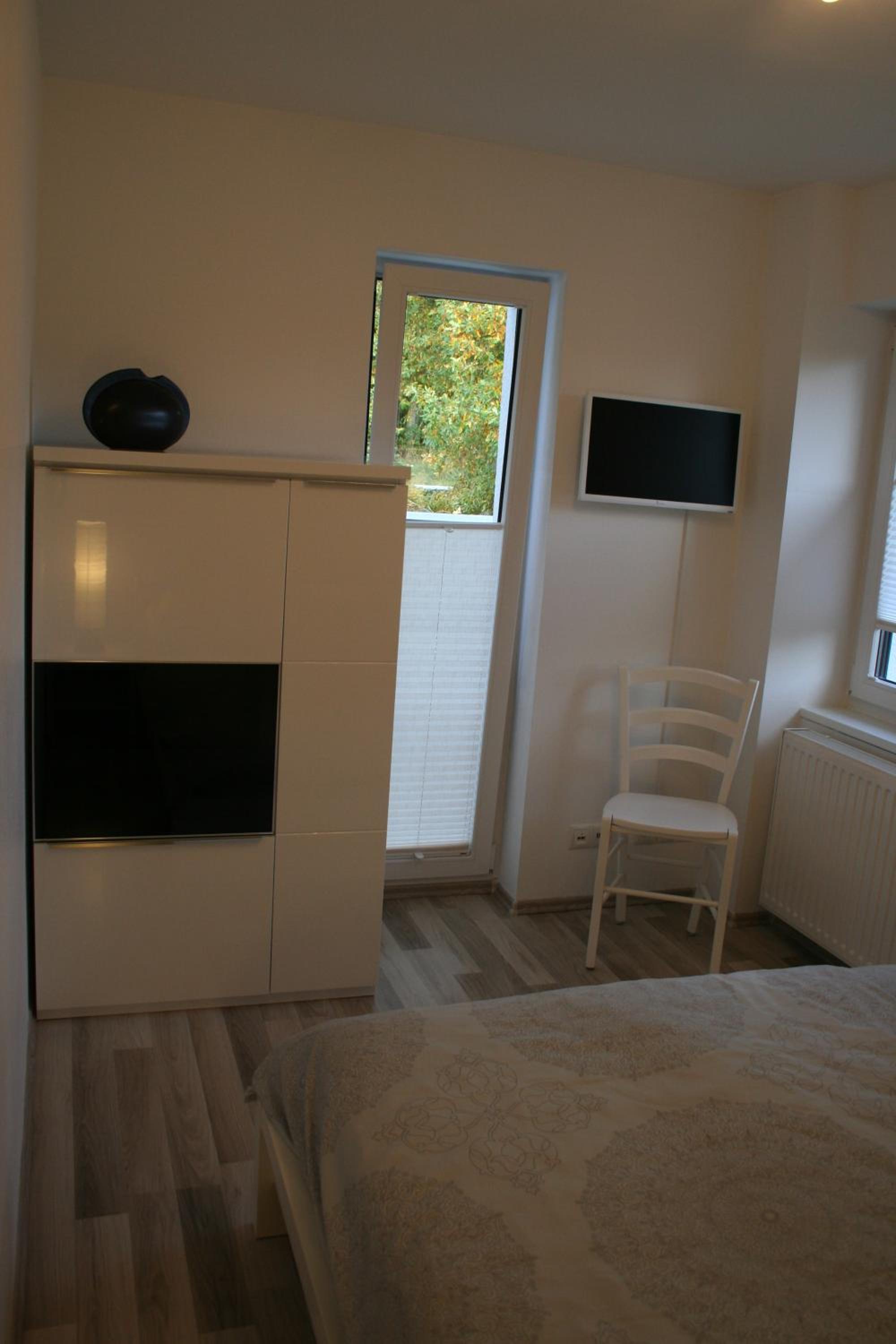 Three-Bedroom Apartment - Photo 7