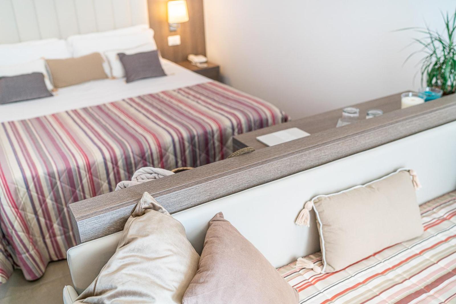 Superior Triple Room with Balcony and Partial Sea View