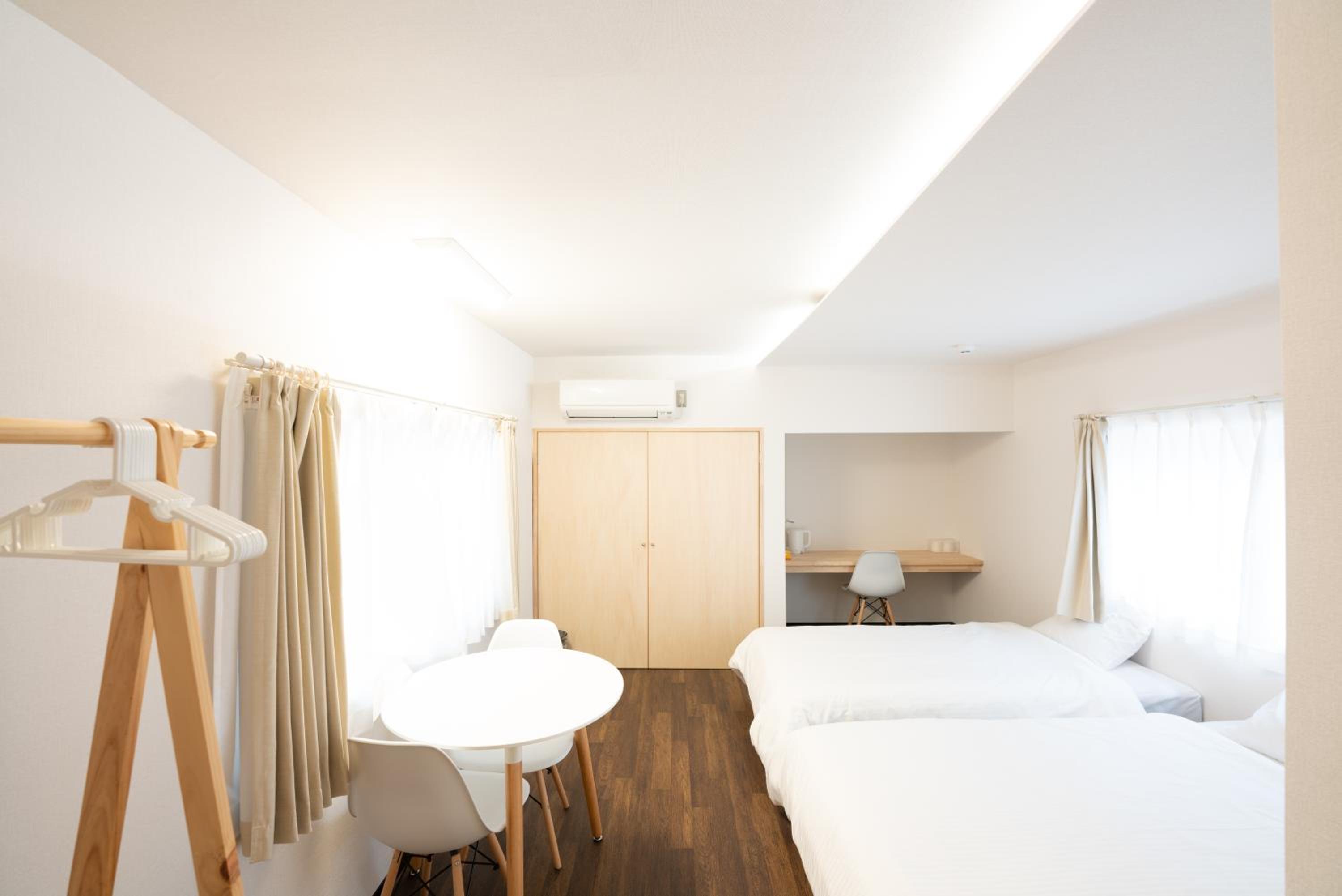 Deluxe Triple Room - Photo 11