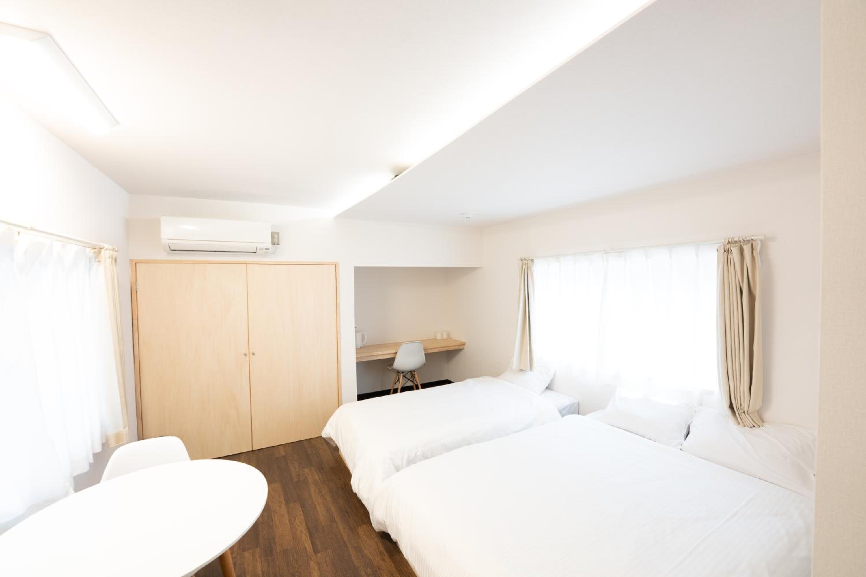 Deluxe Triple Room - Photo 10