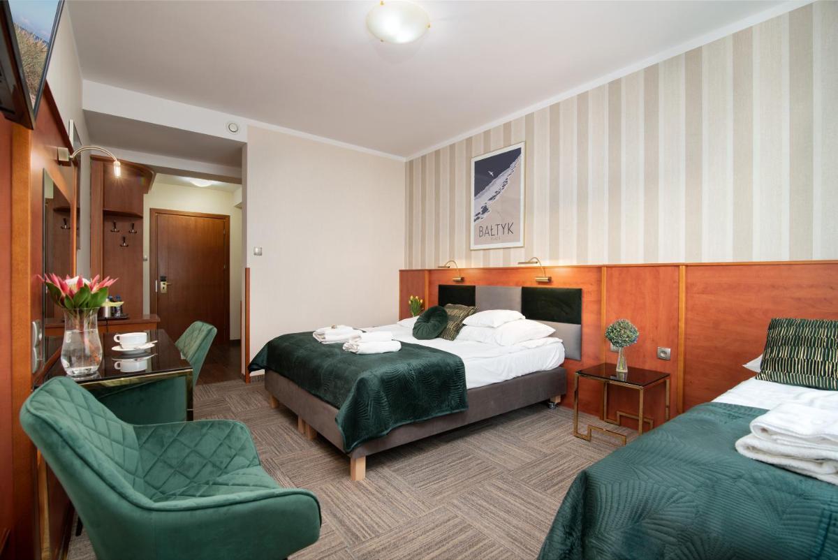 Deluxe Double Room (2 Adults + 1 Child) photo 1
