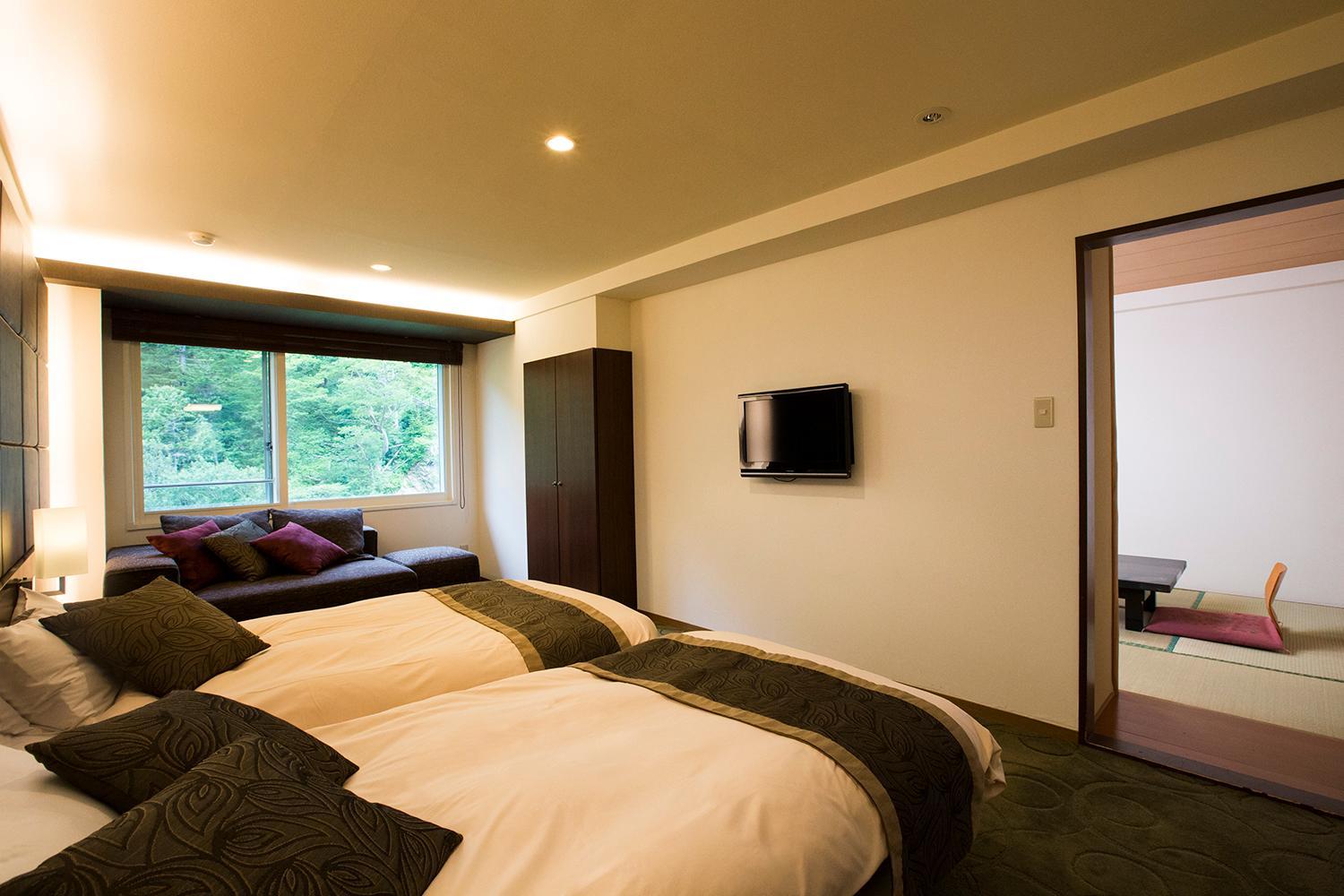 Modern Twin Room with Tatami Area -  Non-Smoking - Photo 1