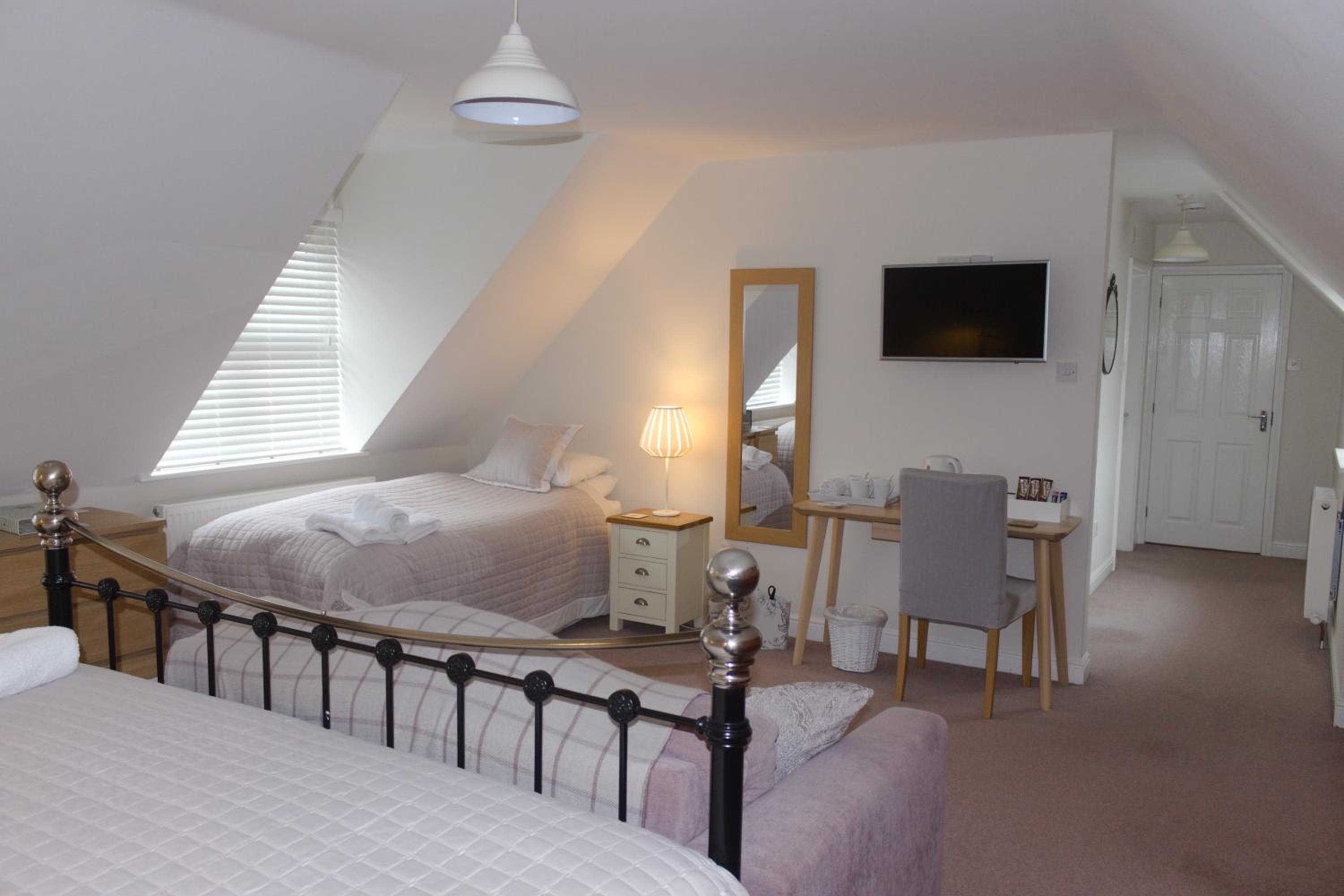 Deluxe Quadruple Room - Photo 1