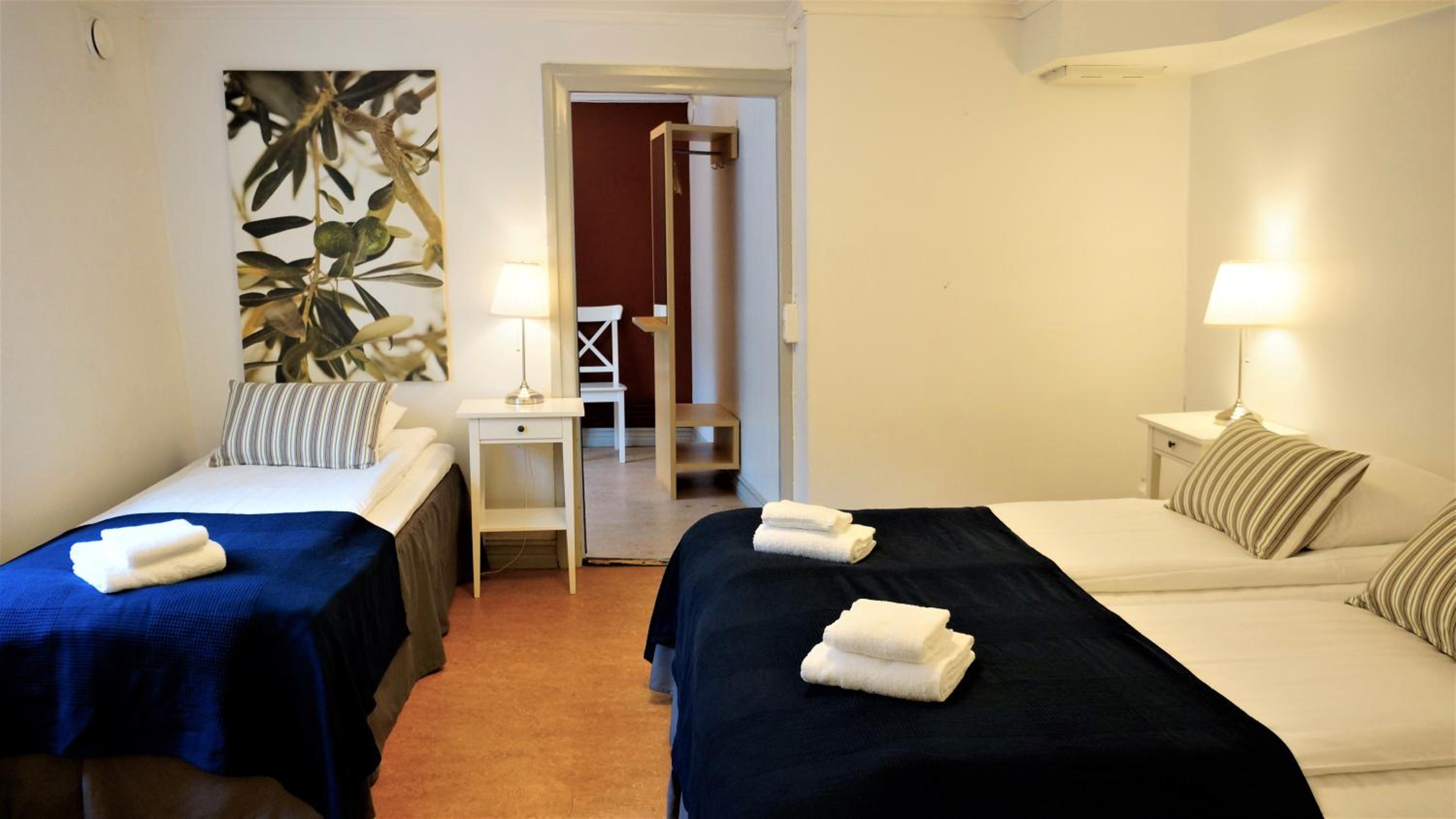 Triple Room with Private Toilet (outside the room) and Shared Shower photo 3