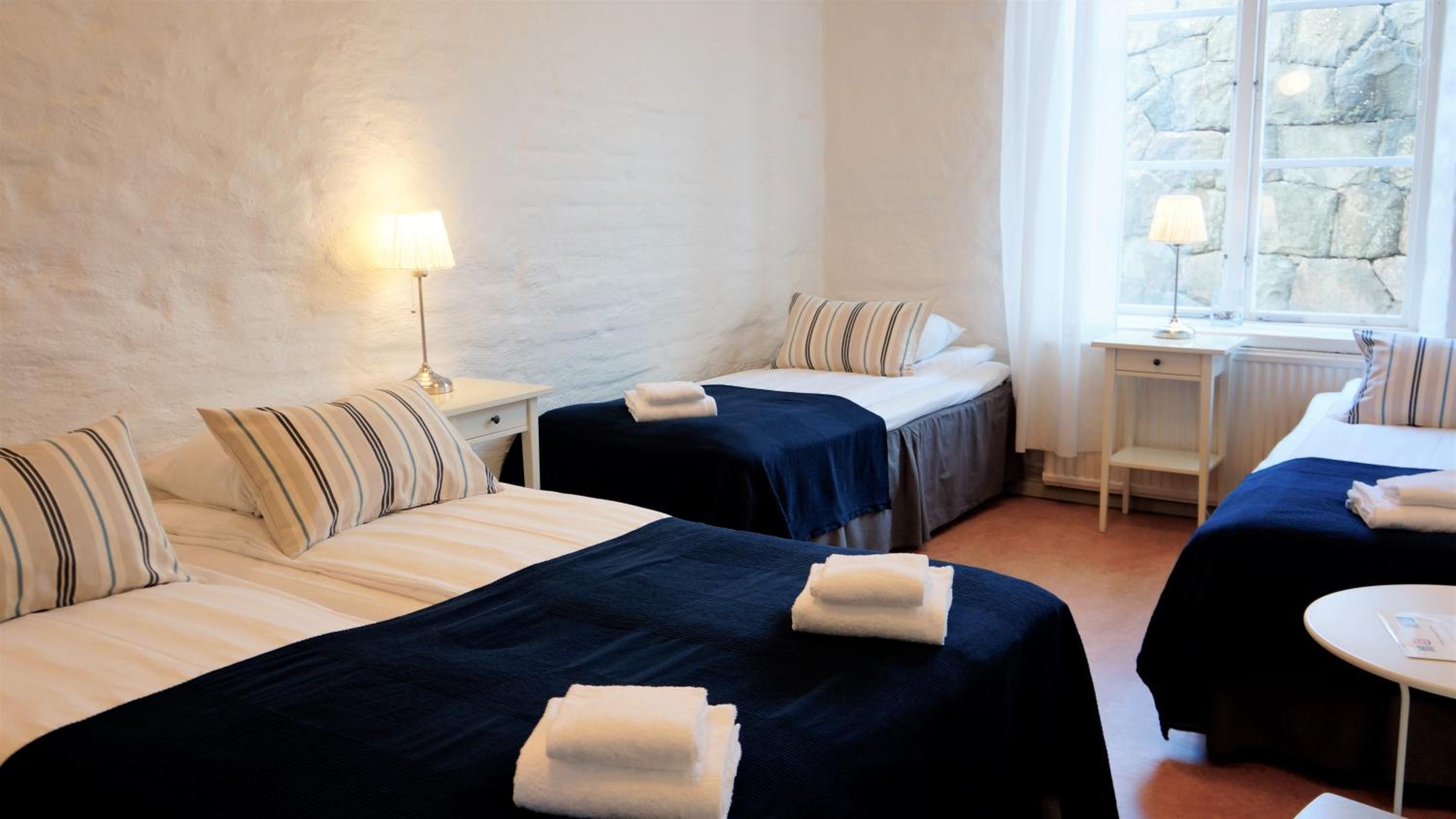 Standard Quadruple Room with Shared Bathroom photo 1