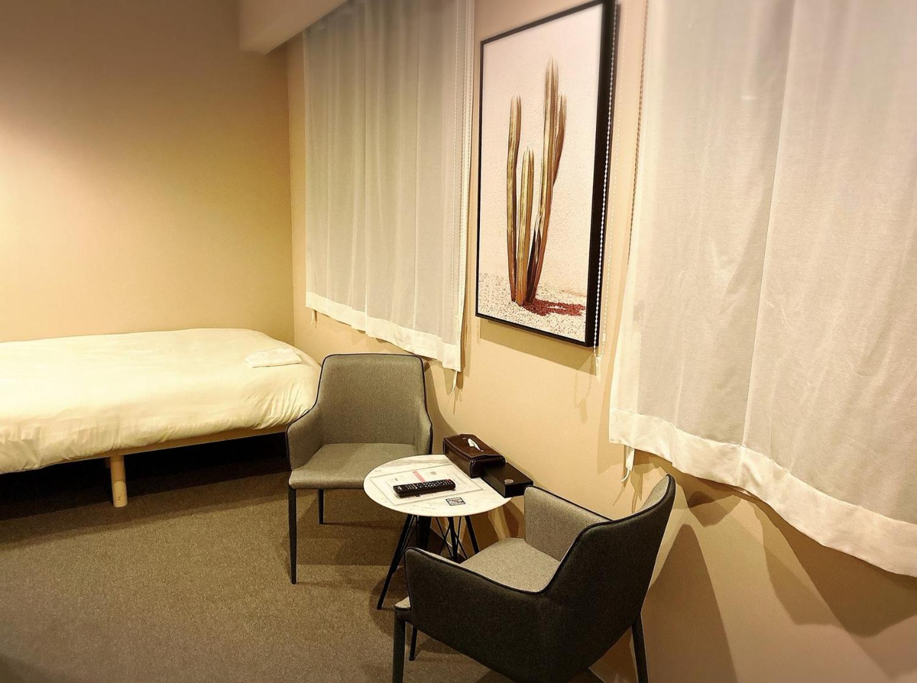 Moderate Twin Room B - Photo 9