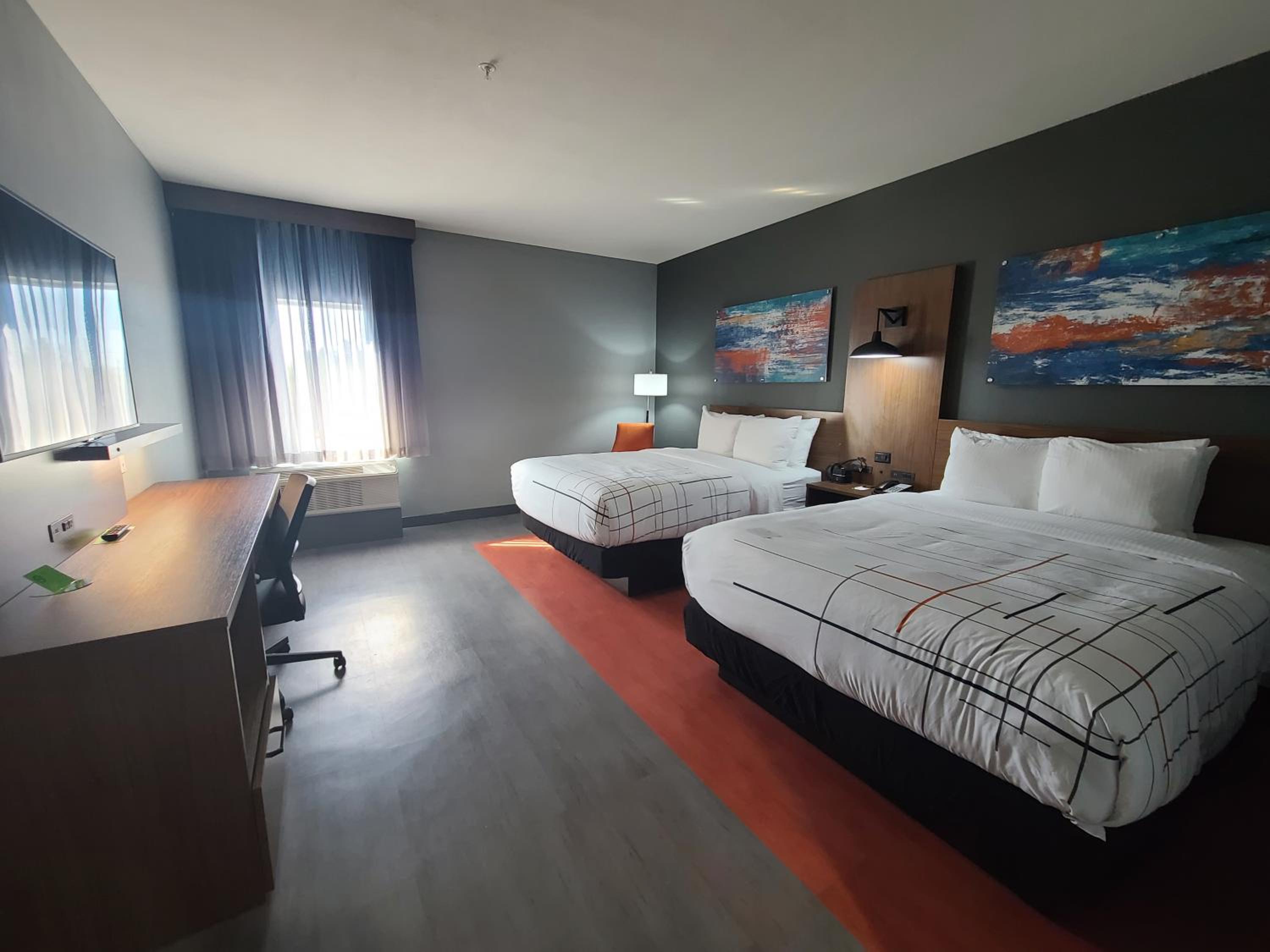 Queen Room with Two Queen Beds and Bath Tub - Mobility/Hearing Access - Non-Smoking - Photo 1