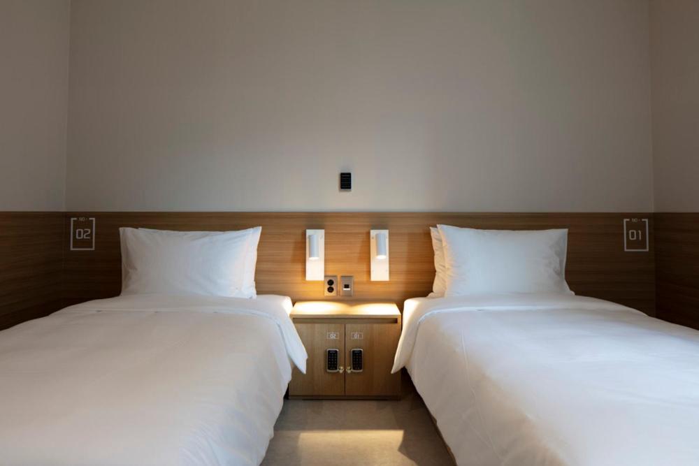 Twin Room with Shared Shower and Toilet