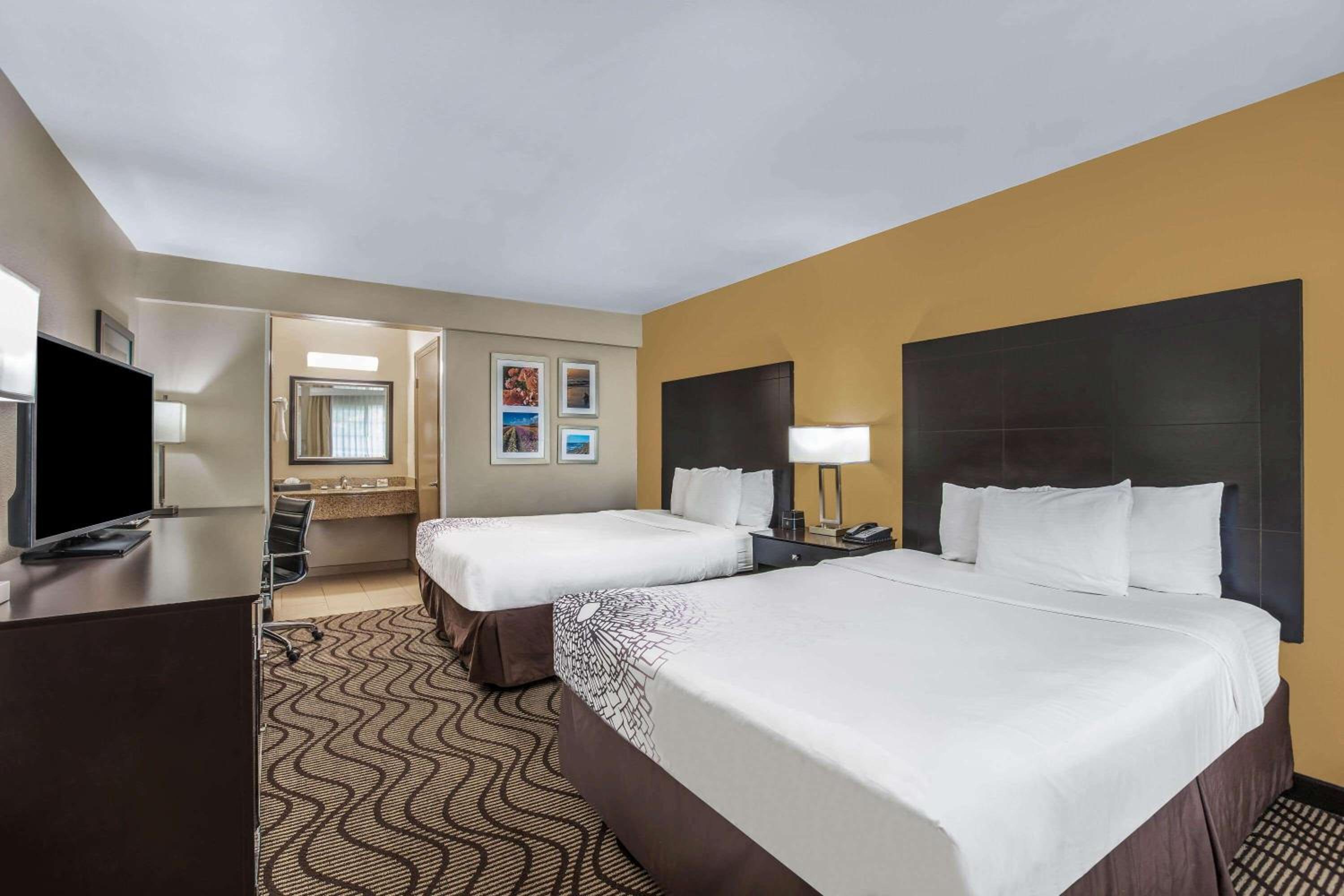 Deluxe Queen Room with Two Queen Beds - Photo 1