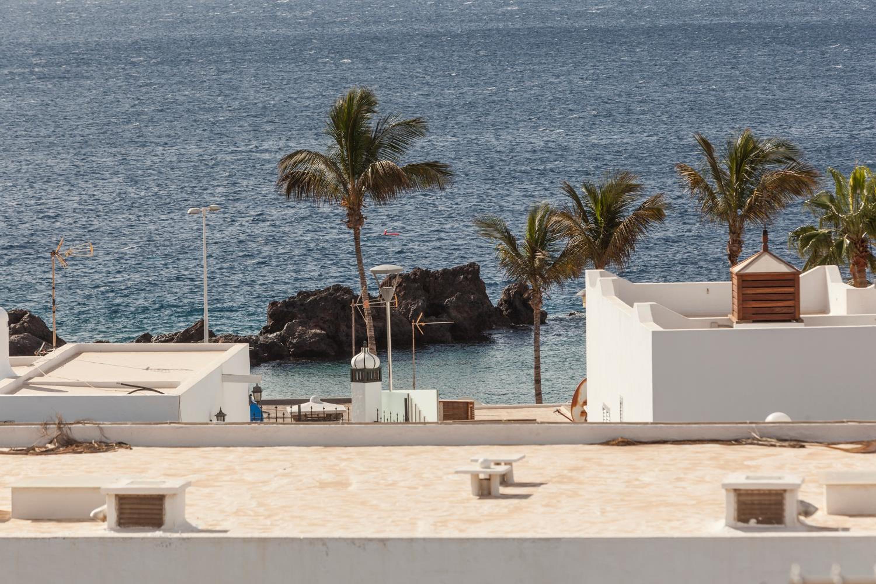 One-Bedroom Apartment with Balcony - Top Floor photo 2
